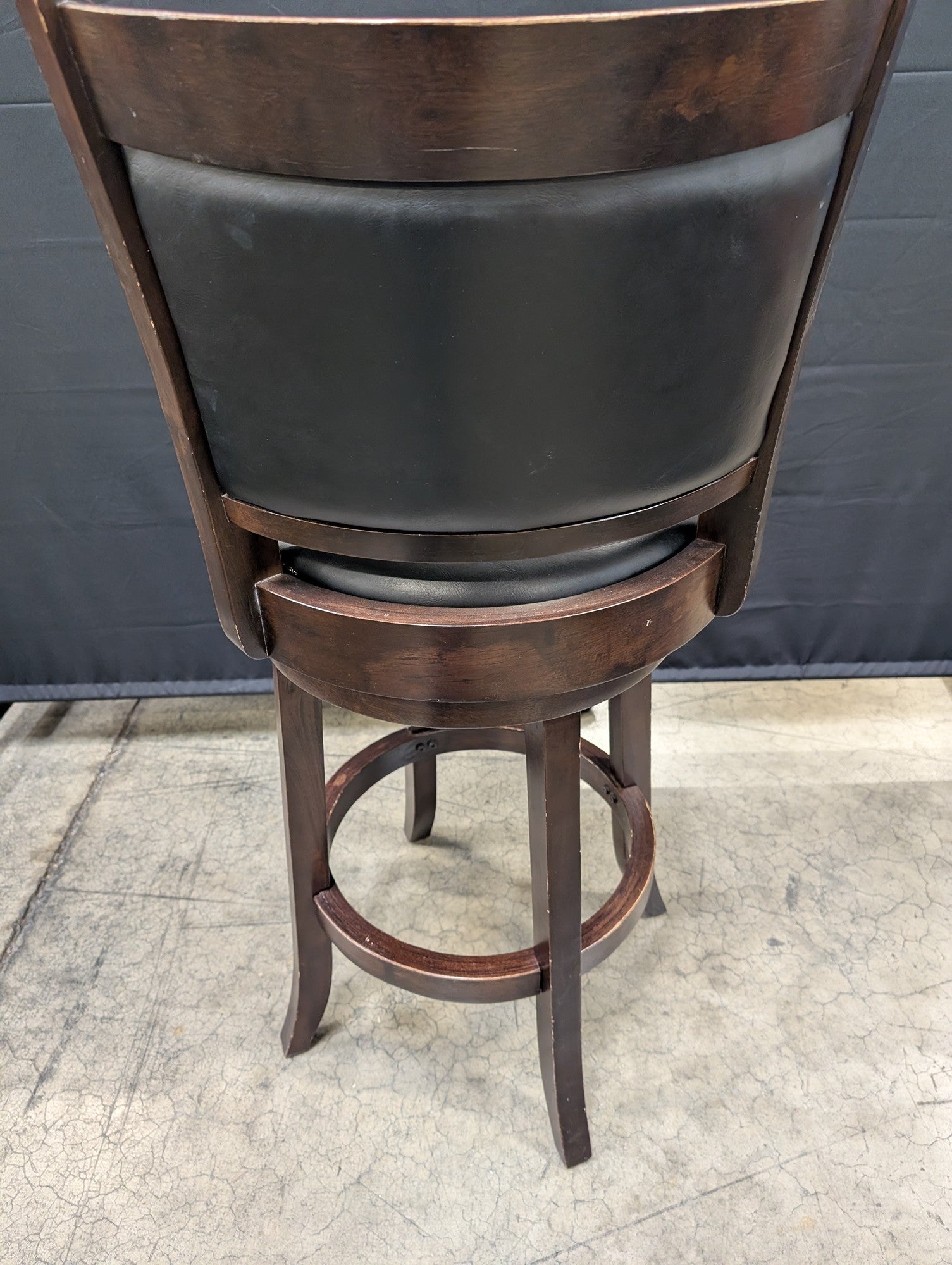 TIMBERCO Dark Wood Swivel Bar Stool with Black Upholstery