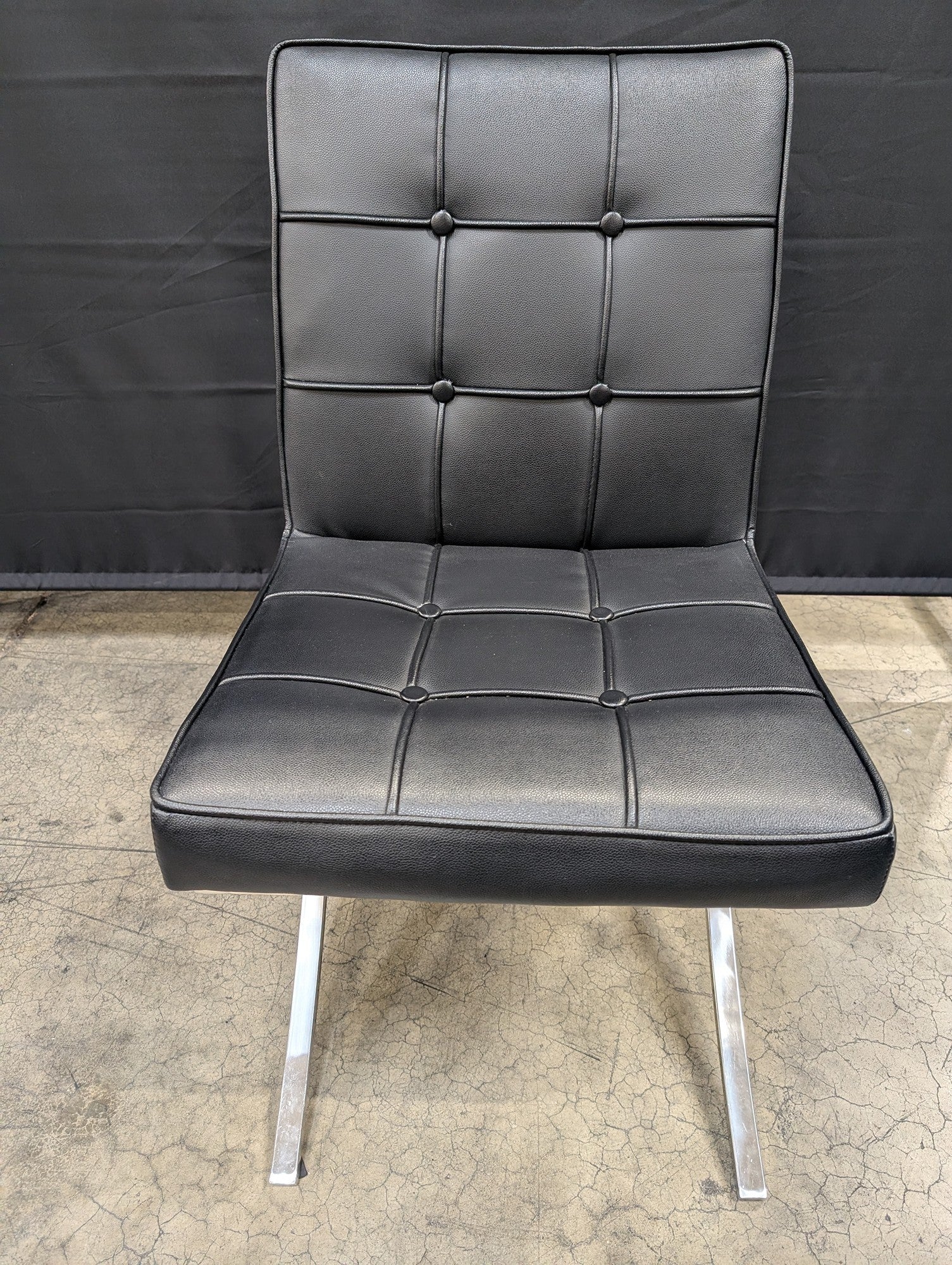 Modern Black Tufted Accent Chair with Chrome X-Base