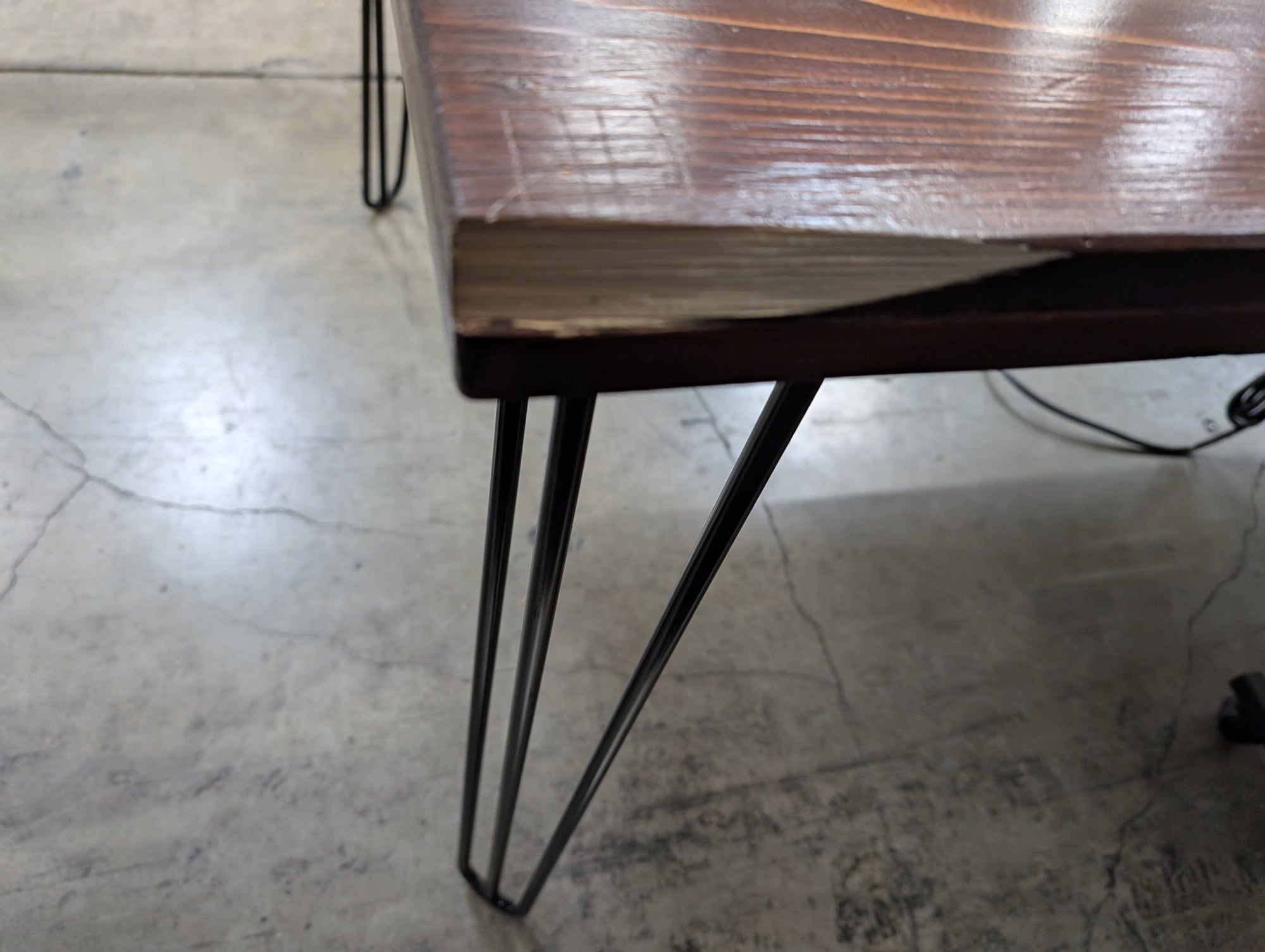 Industrial Wood Plank Desk with Hairpin Legs and Integrated Power Module some damage