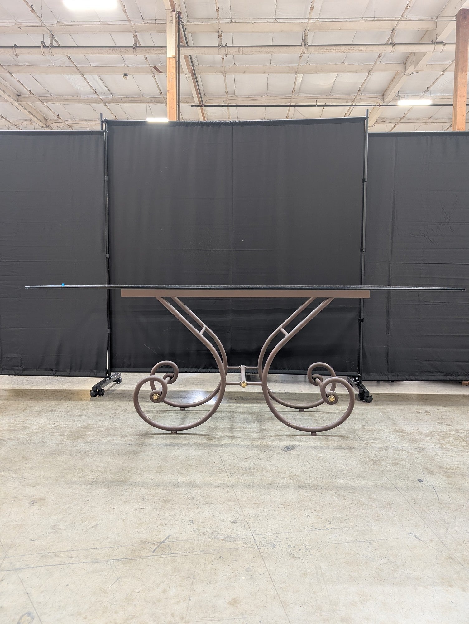 Grand Scrolled Metal Base Glass Top Dining Table