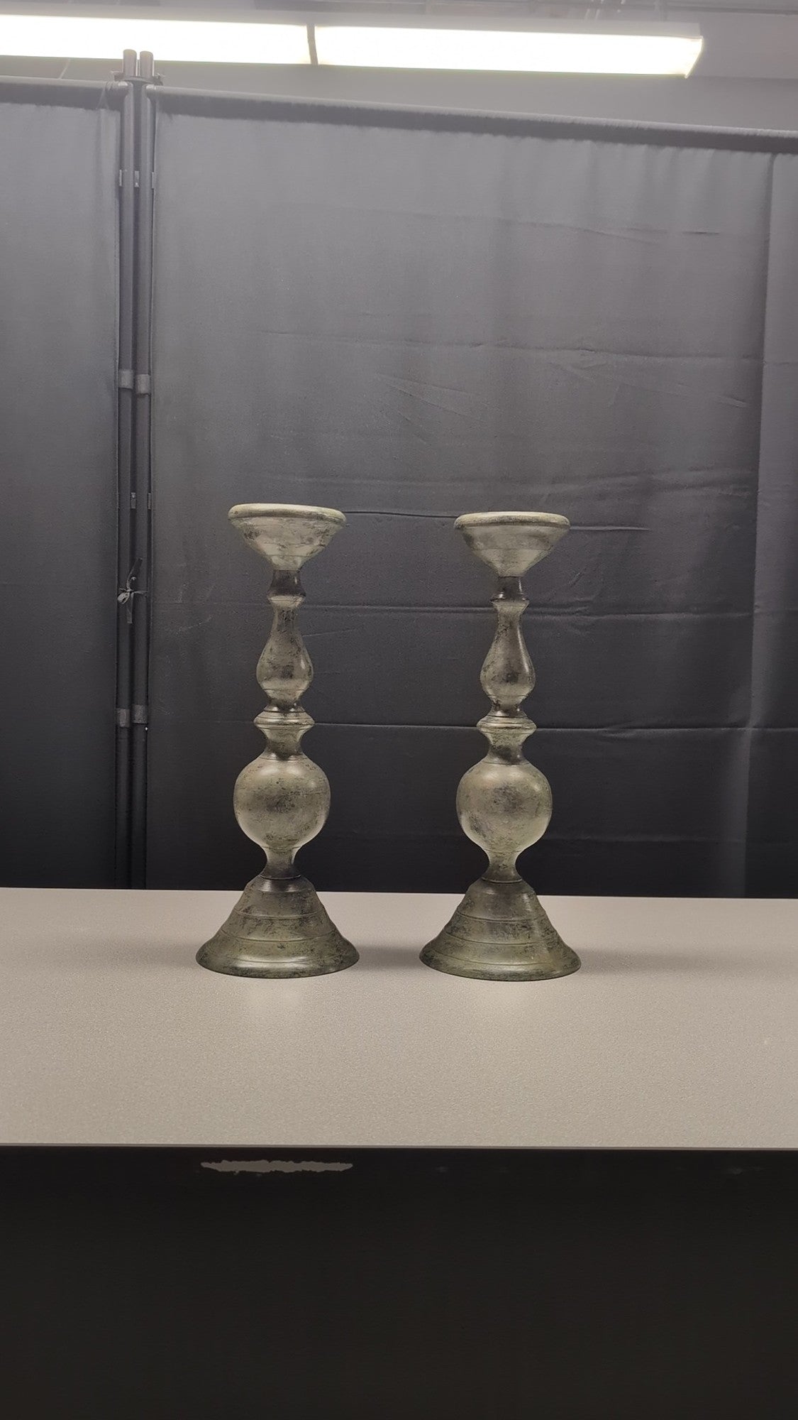 Pair of Distressed Metal Baluster Candlestick Holders