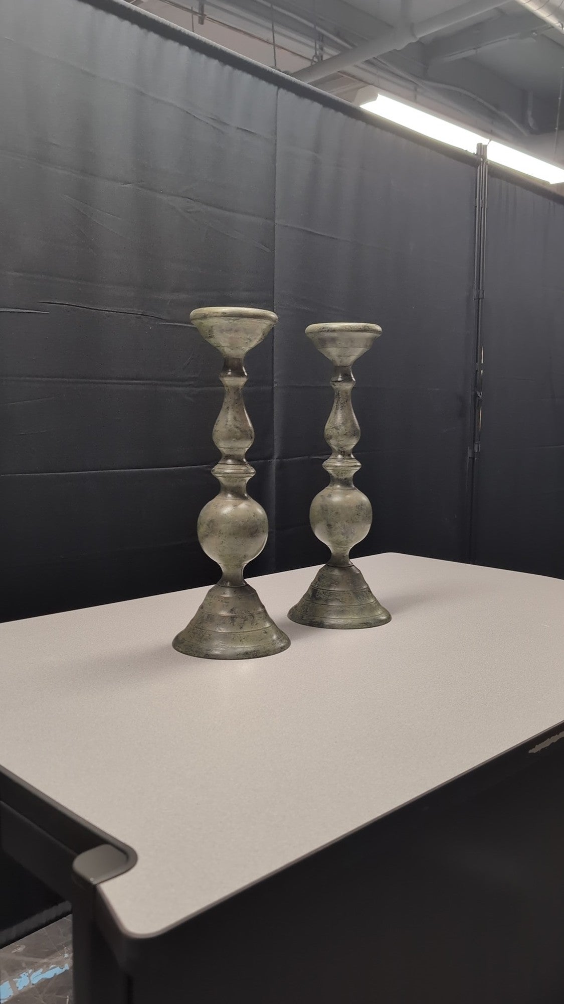 Pair of Distressed Metal Baluster Candlestick Holders