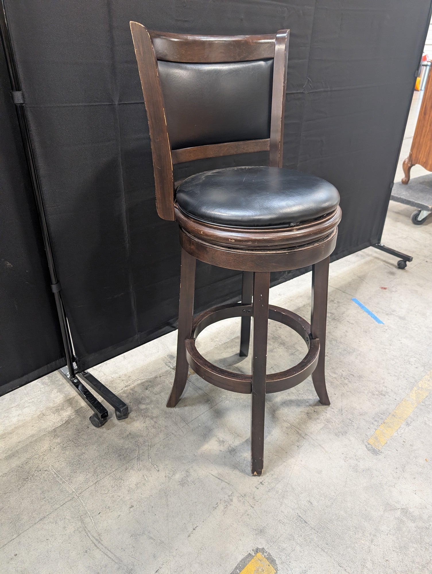 Dark Wood Swivel Bar Stool with Black Upholstery