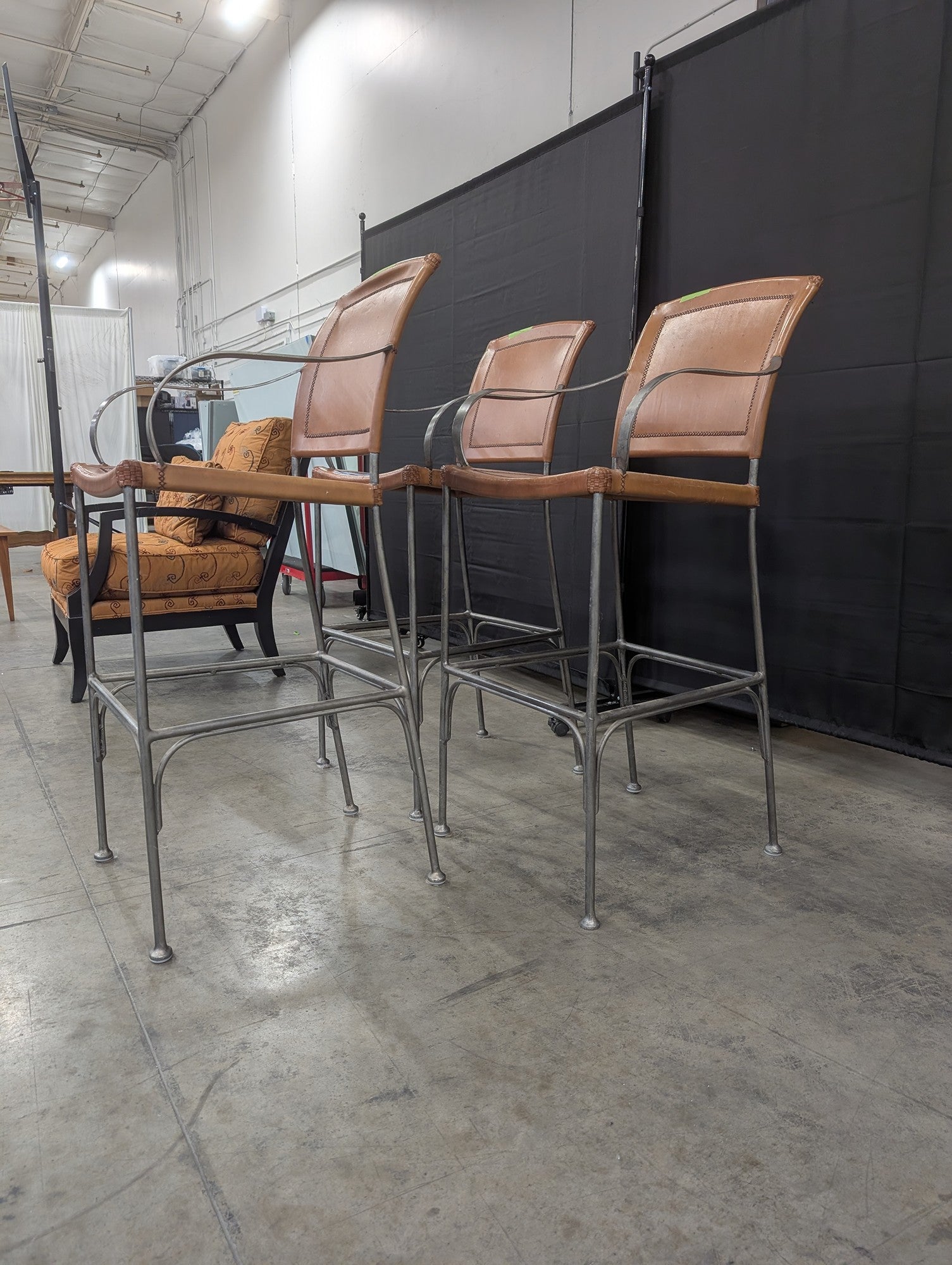Set of Three Tan Leather Bar Stools with Arms