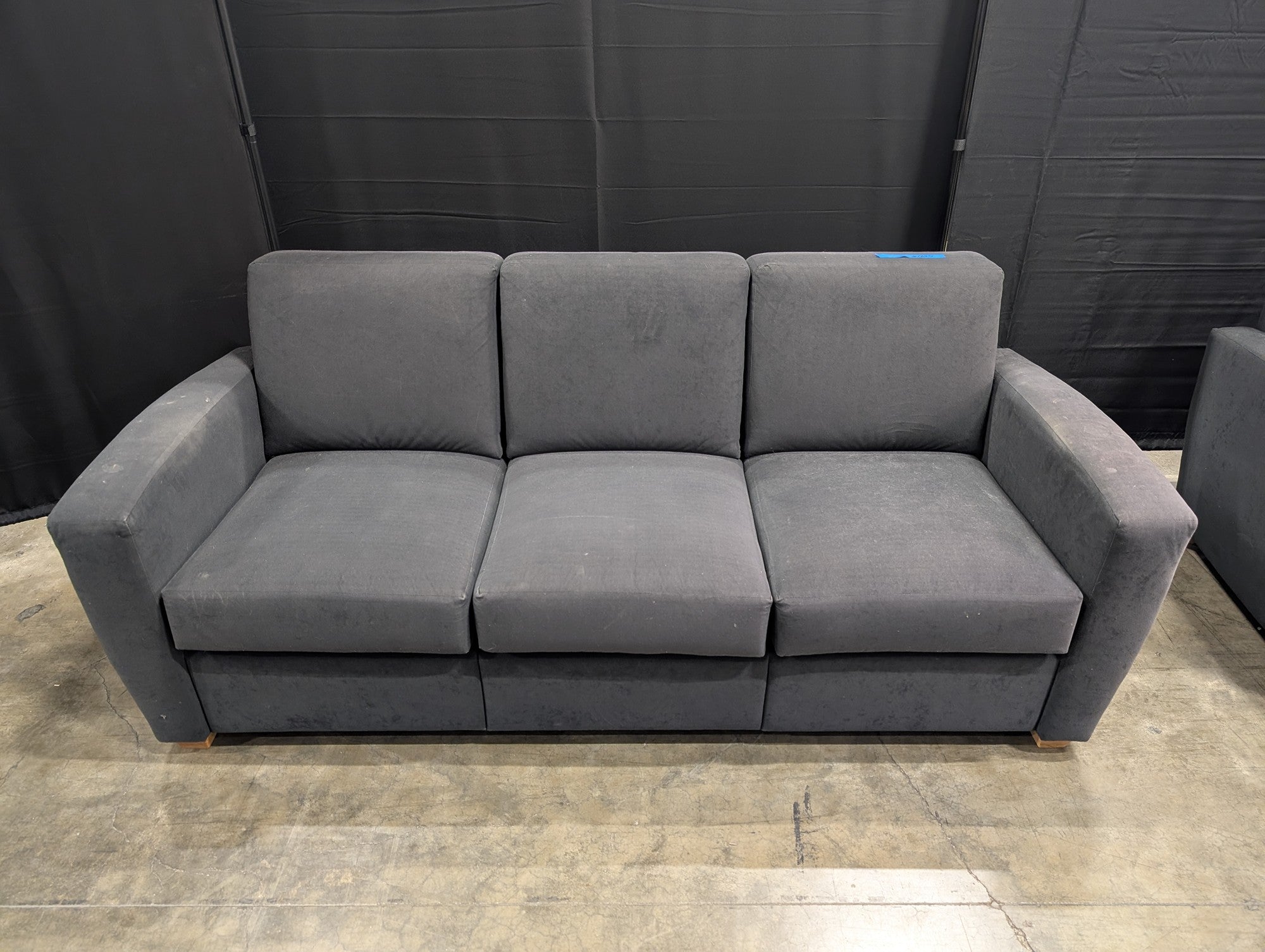 Dark Gray Fabric Three-Cushion Couch