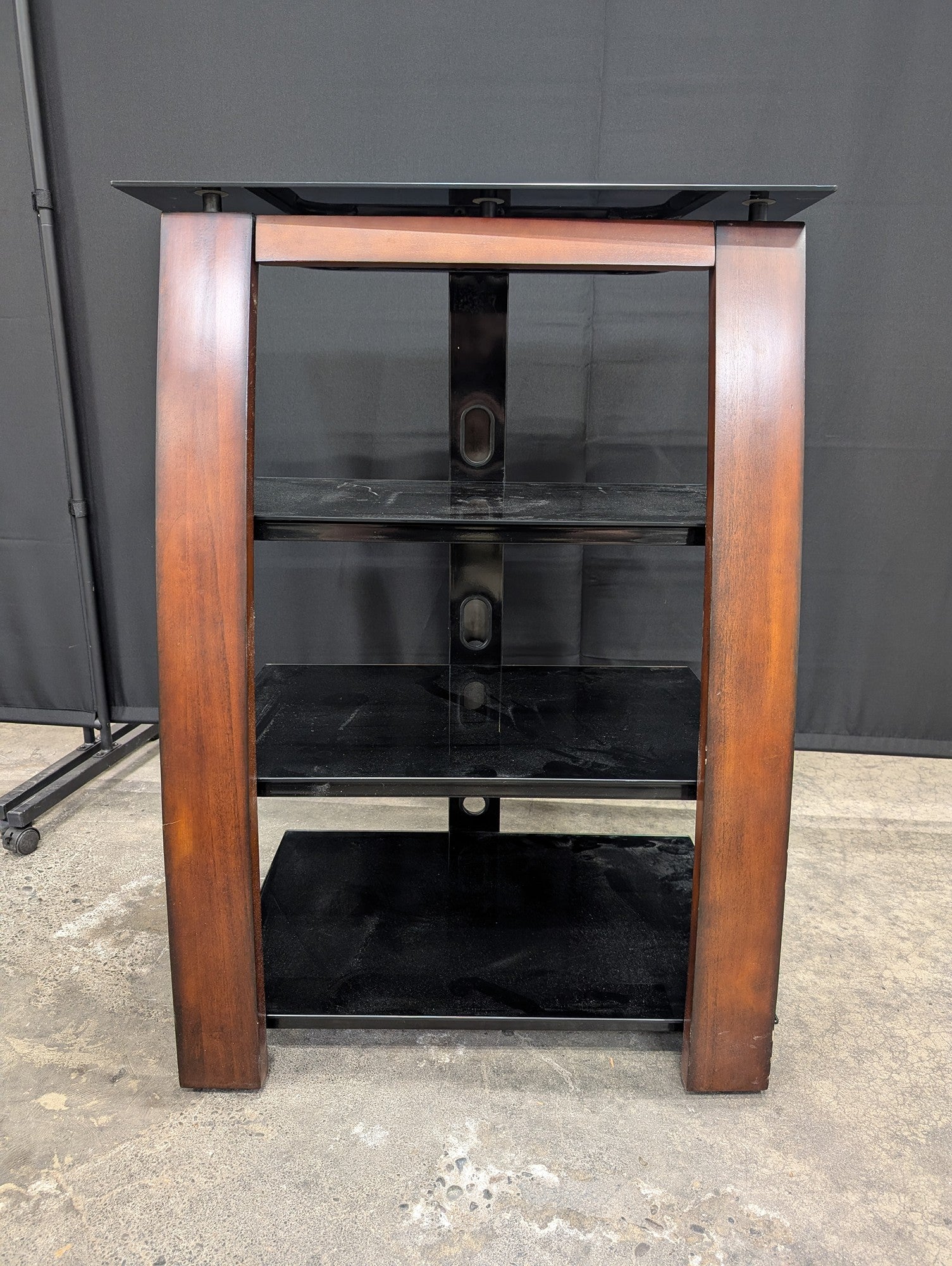 Dark Wood Four-Shelf TV Stand with Black Glass