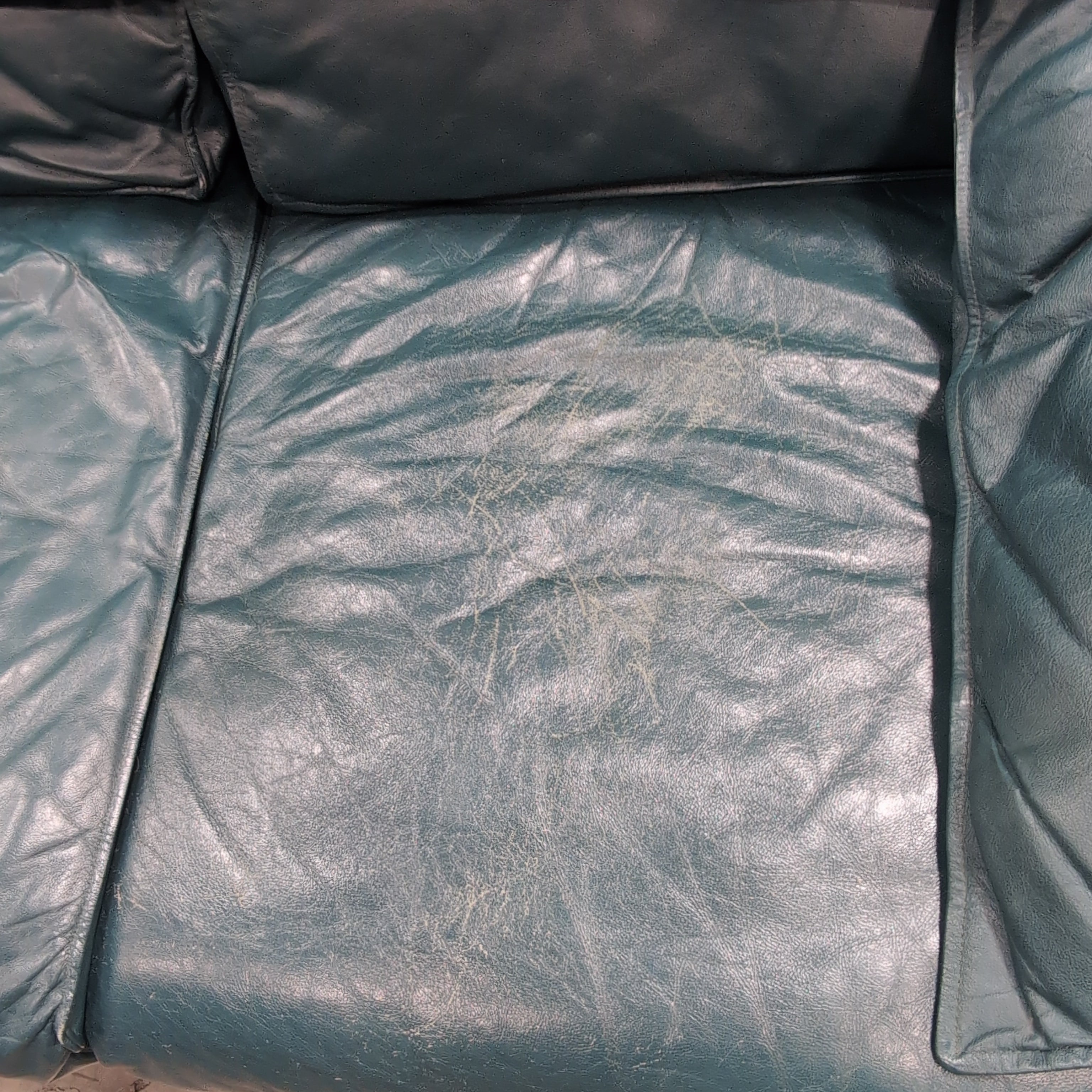 Deep Green Padded Loveseat in Leather