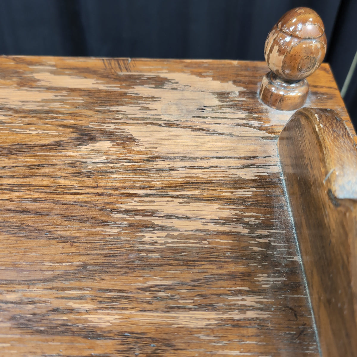 Dark Stained Wood Nightstand with Ornate Hardware