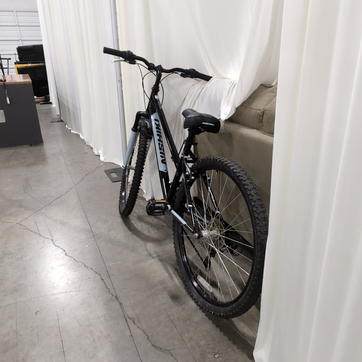 Black Nishiki Pueblo Mountain Bicycle with Front Suspension