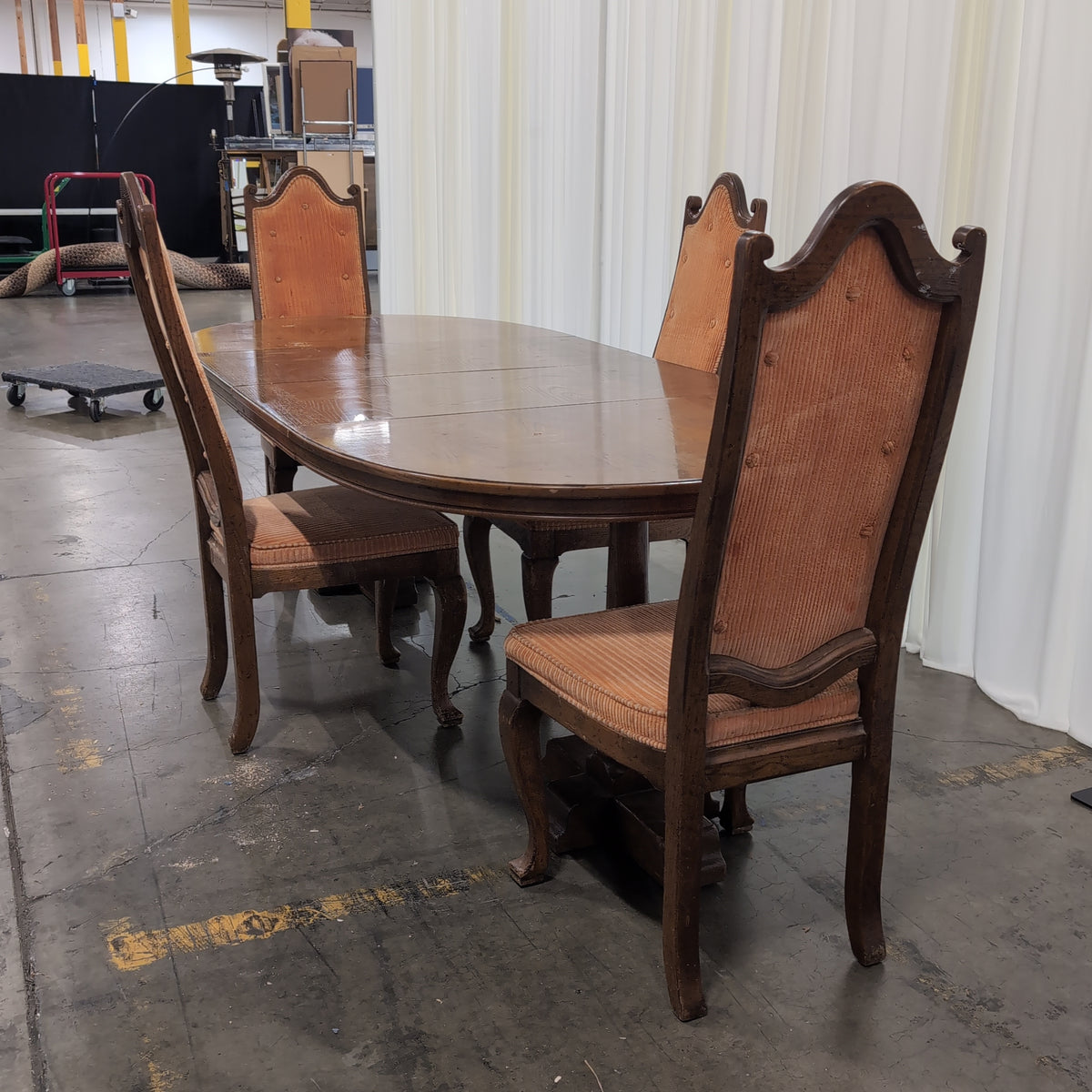 Traditional Dark Wood Oval Dining Table with Four Chairs