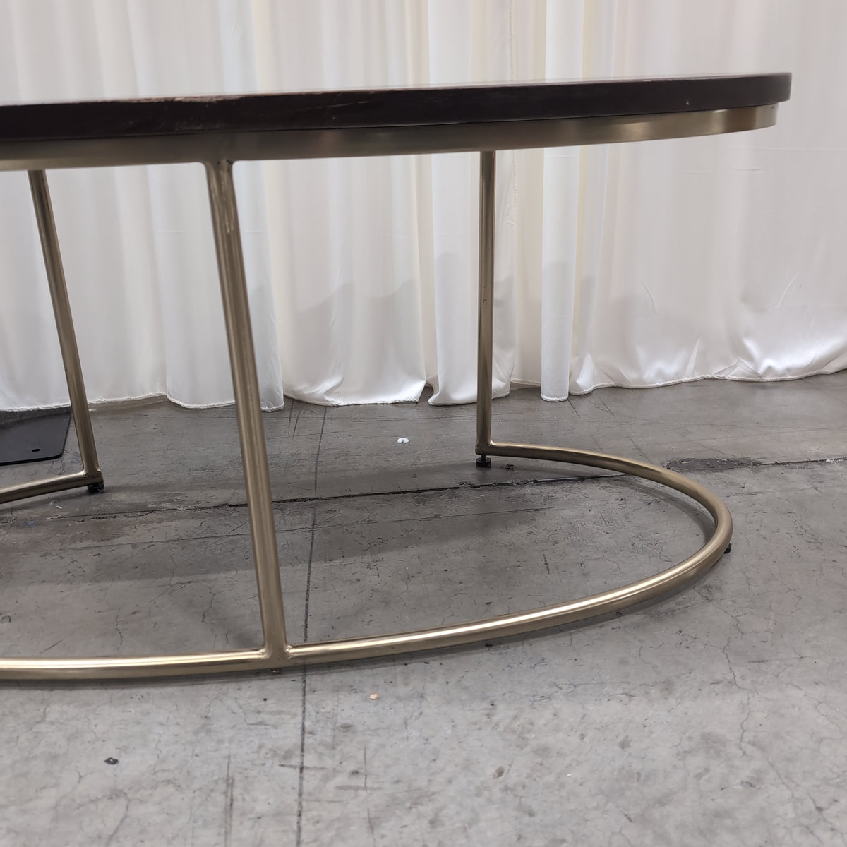 Oval Dark Wood Coffee Table with Gold Metal Base