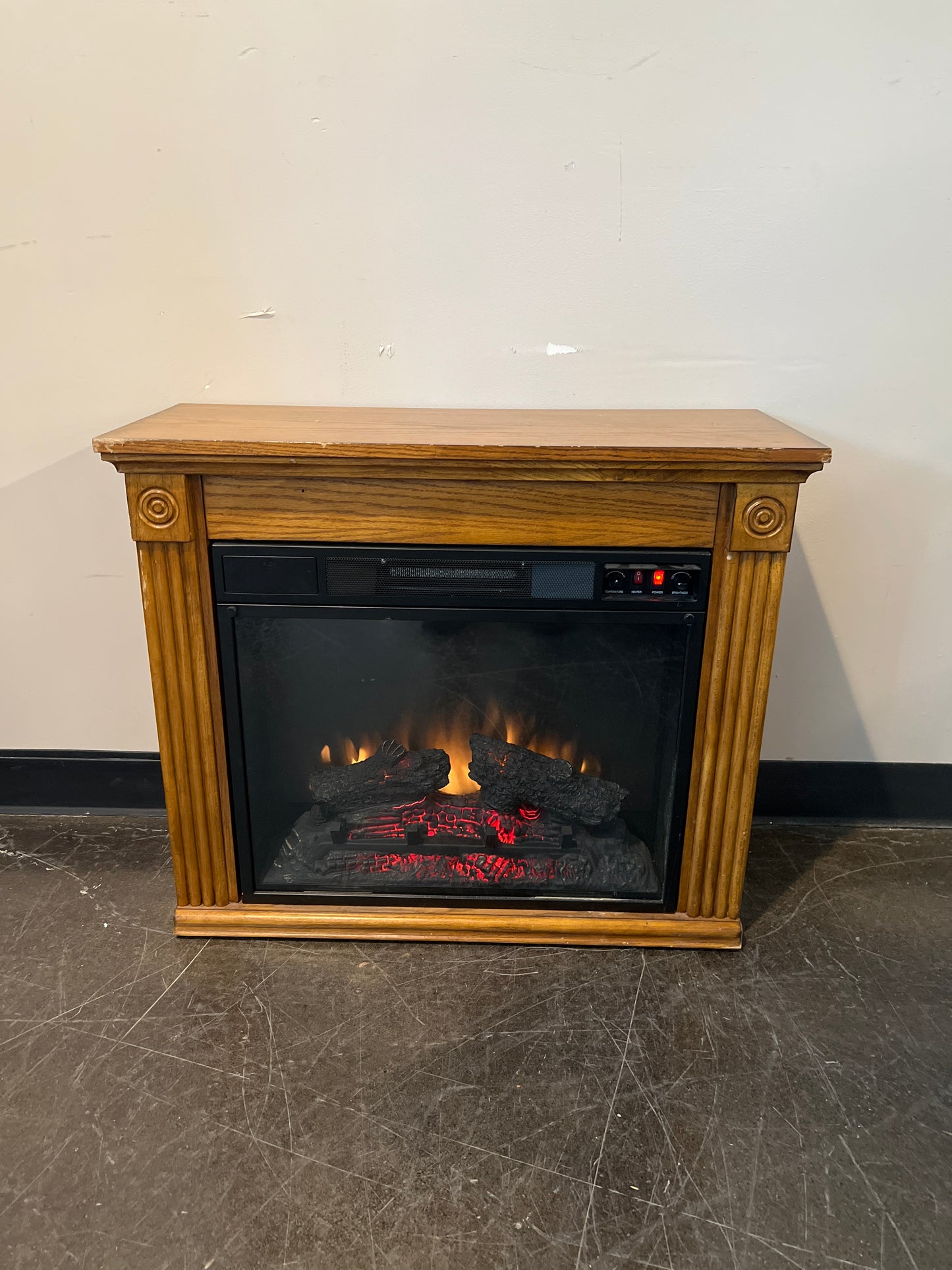 Electric Fireplace with Wood Mantel