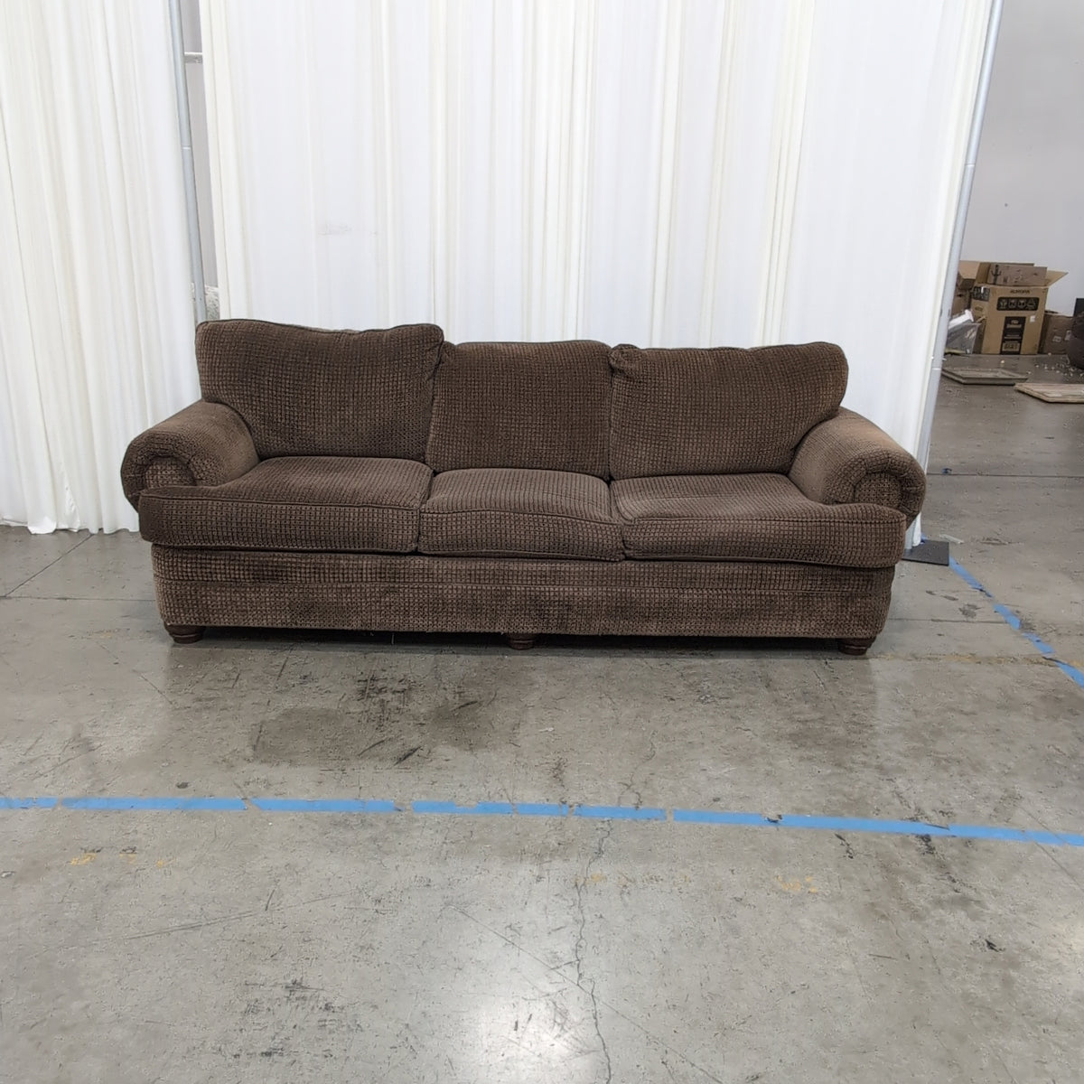 Brown Rolled Arm Three-Cushion Couch in Textured Fabric