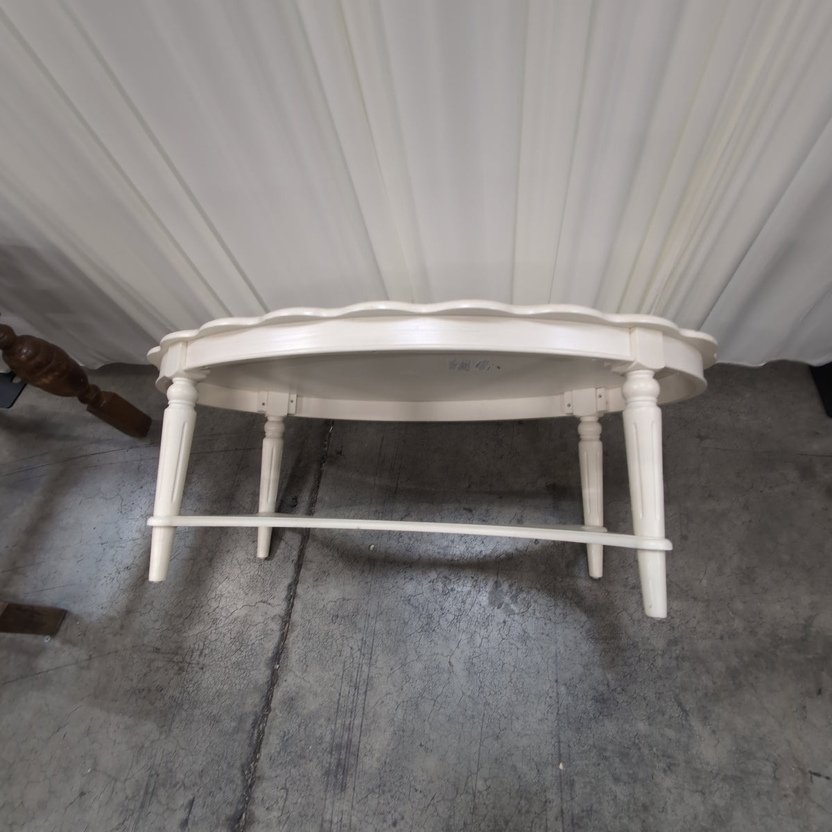 White Scalloped Oval Coffee Table