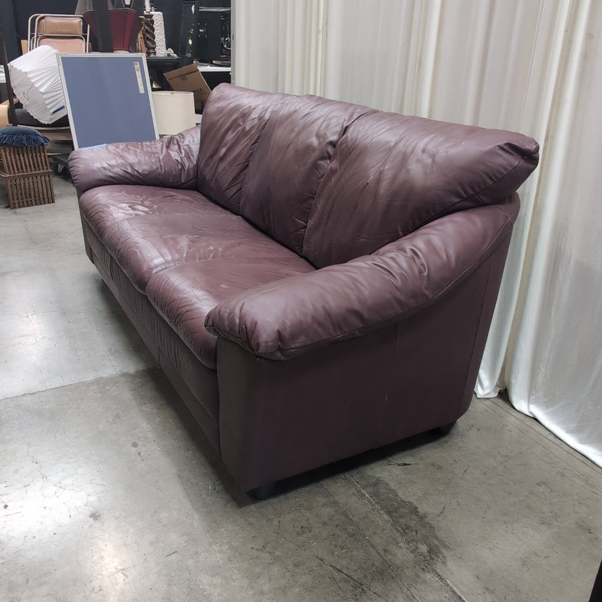 Burgundy Padded Leather Couch