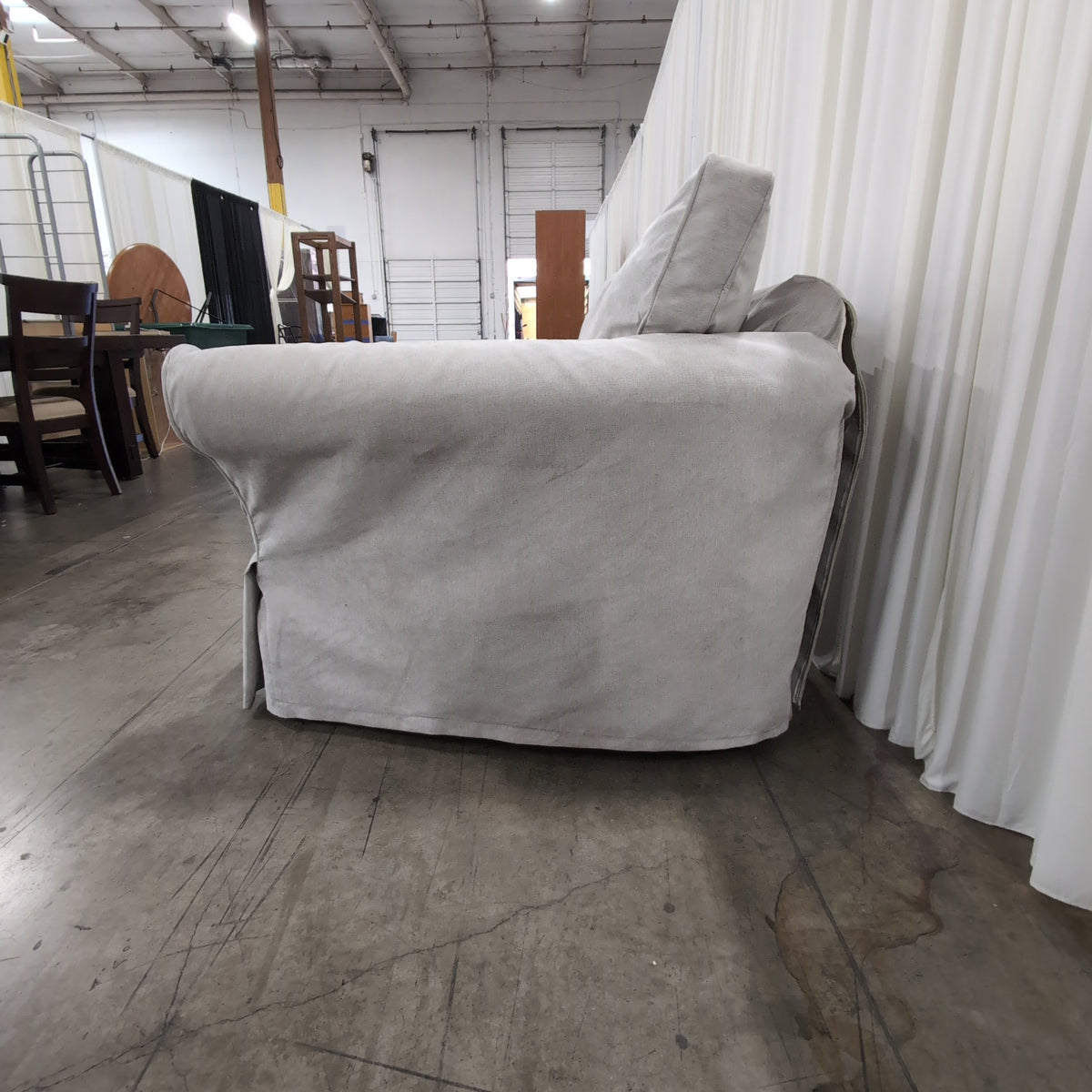 Light Grey Fabric Rolled Arm Loveseat with Skirted Base
