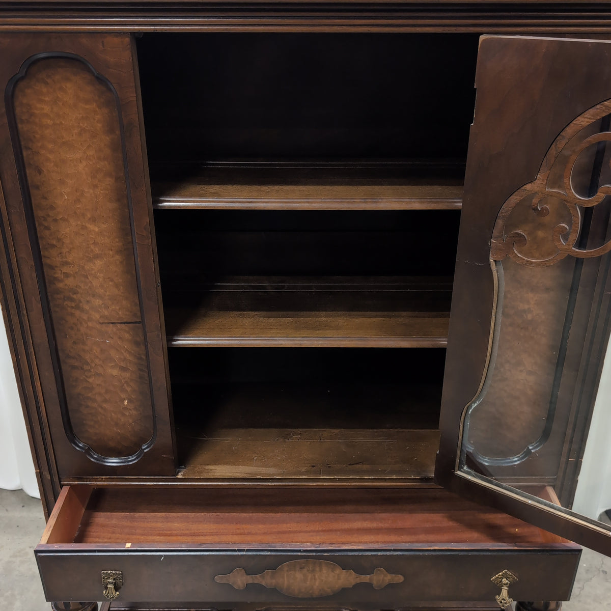 Ornate Dark Wood China Cabinet with Scrollwork