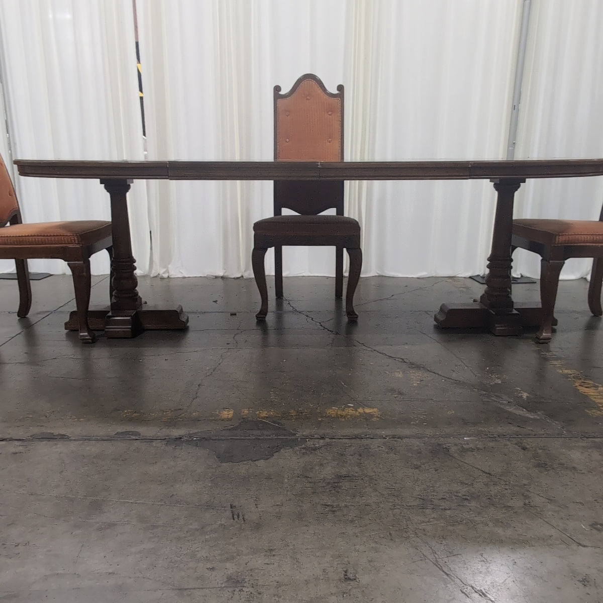 Traditional Dark Wood Oval Dining Table with Four Chairs