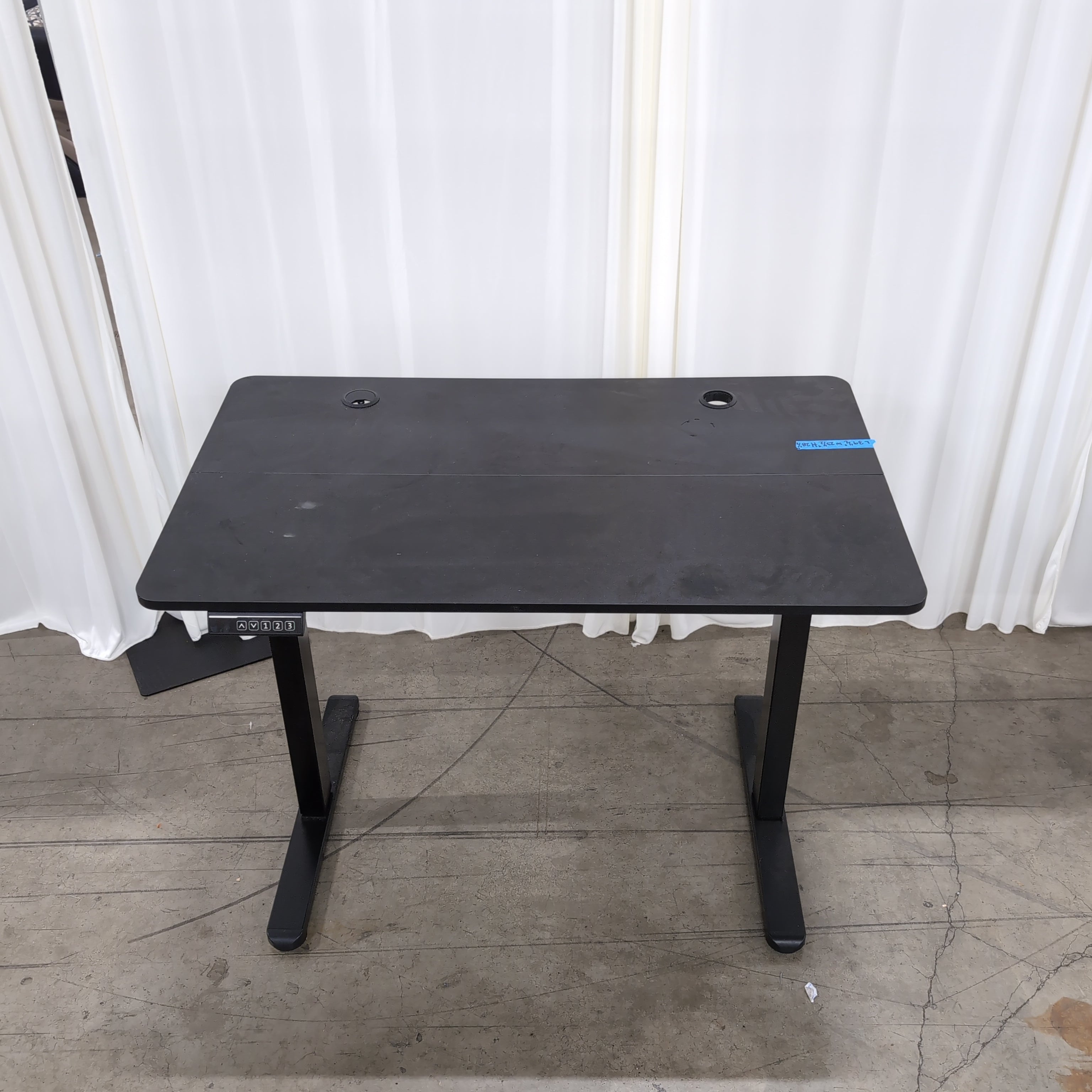 Black Electric Height-Adjustable Desk with Grommet Holes