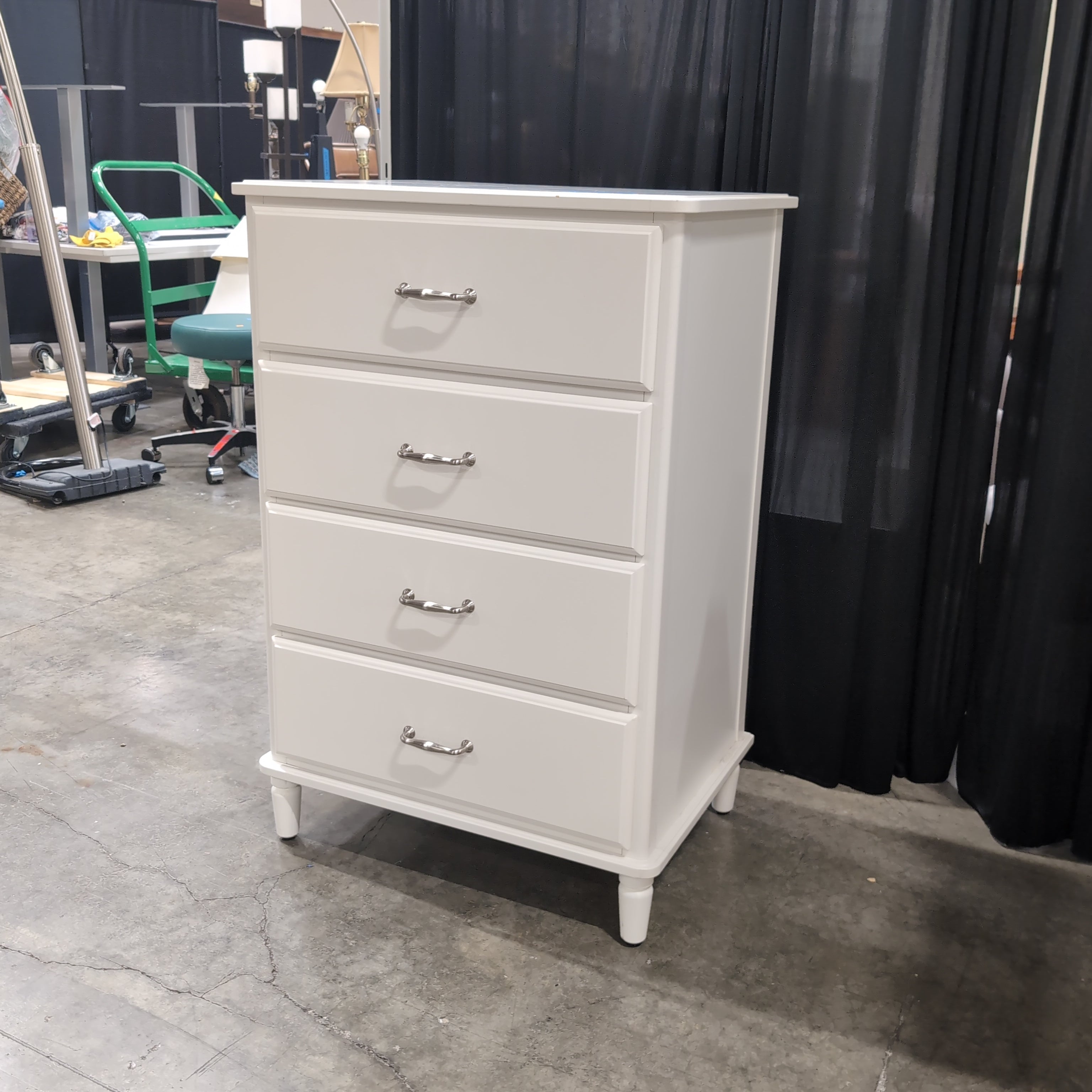 White Four-Drawer Dresser with Silver Pulls
