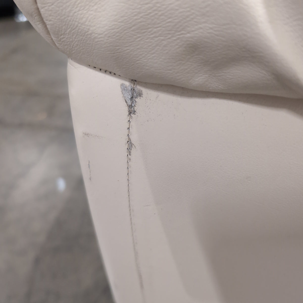 Cream Rolled Arm Loveseat in Leather