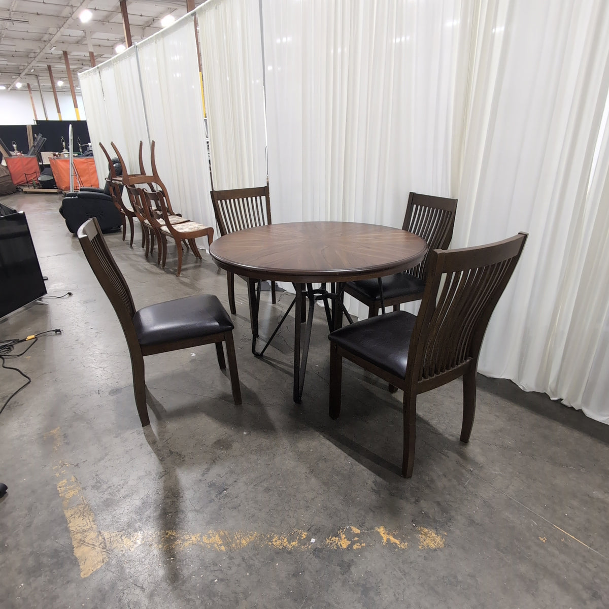 Round Dark Wood Dining Table with Sunburst Veneer