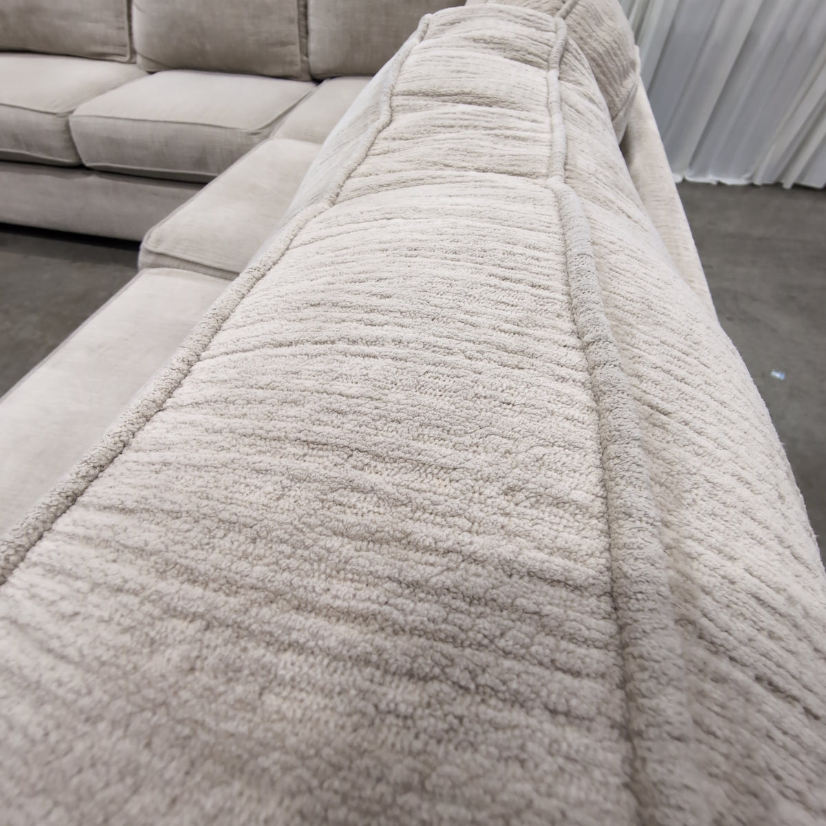 Light Beige Textured Fabric Sectional Couch with Rolled Arms