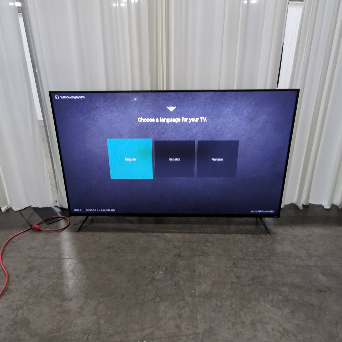 Large Black Flat Screen TV with Stand