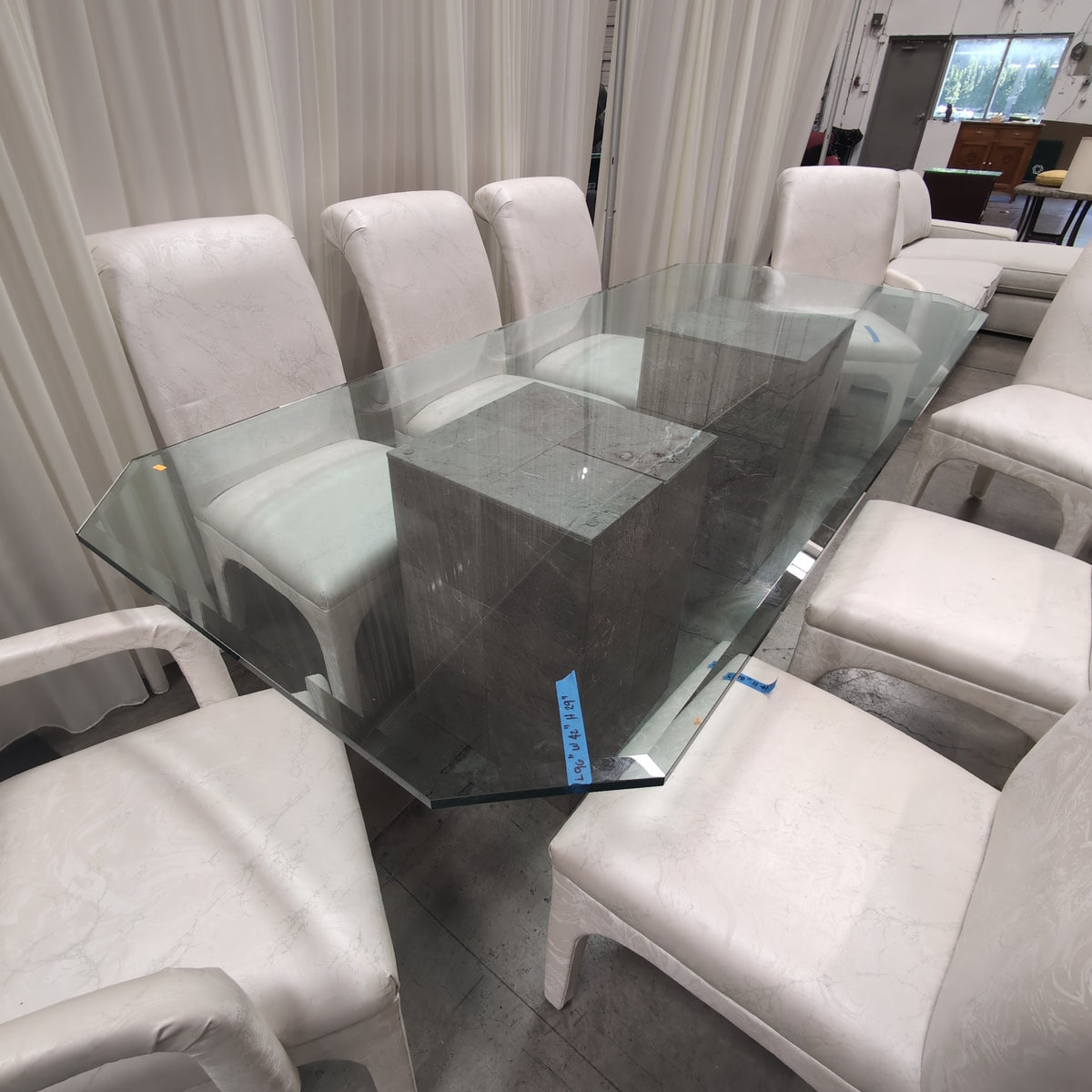 Glass Top Stone Base Dining Table with Eight Upholstered Chairs