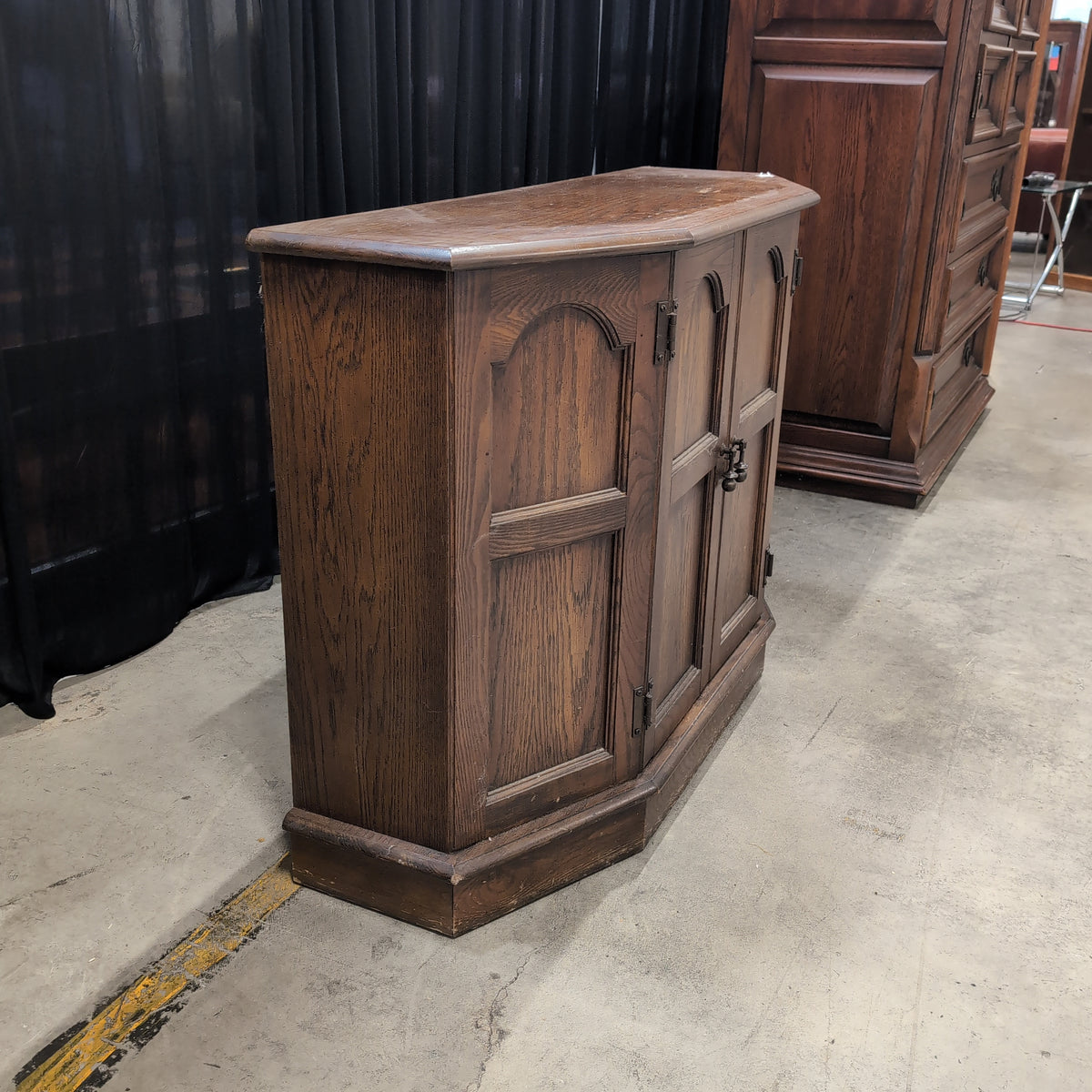 Dark Wood Corner Cabinet with Arched Panels