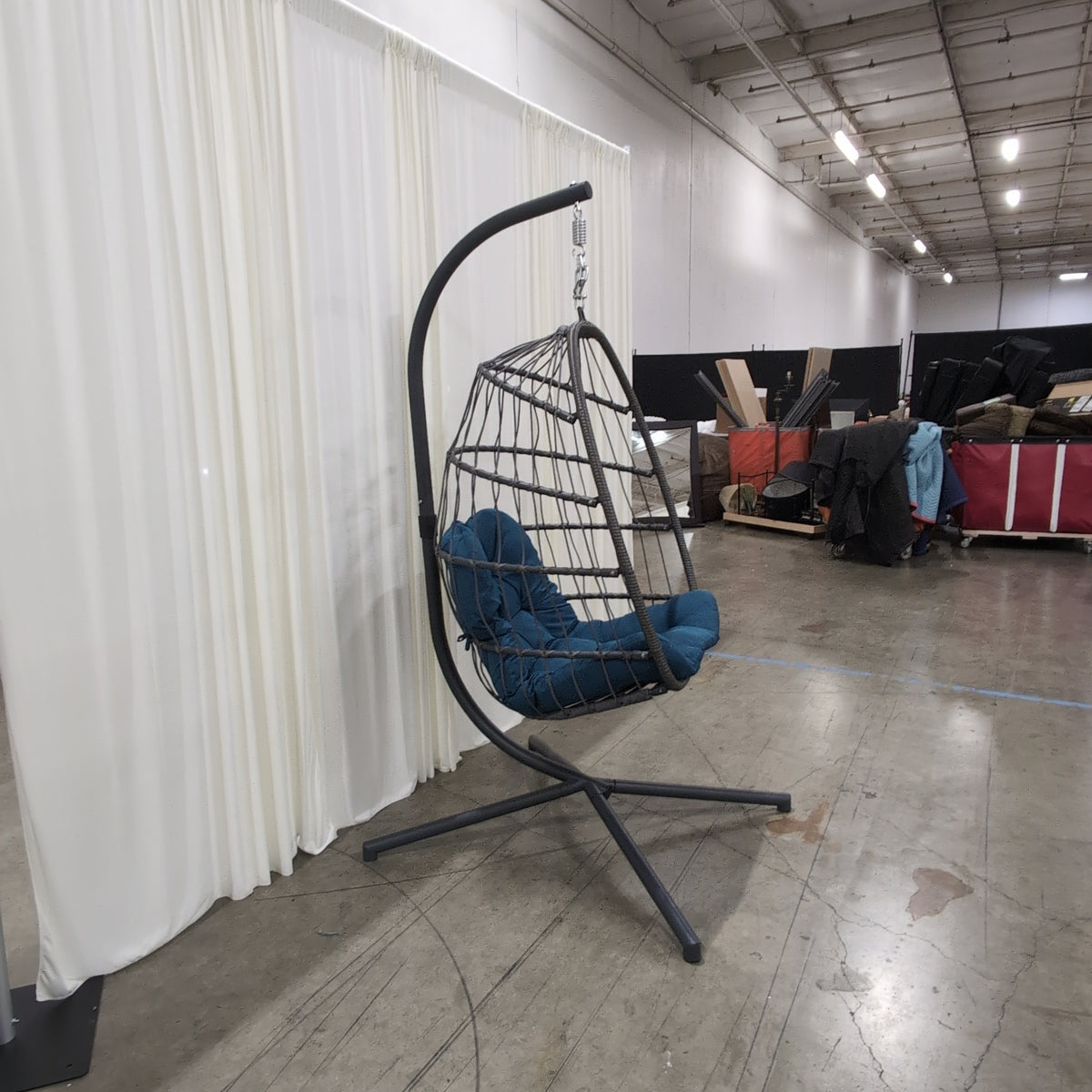 Gray Wicker-Look Swing Egg Chair with Teal Cushion