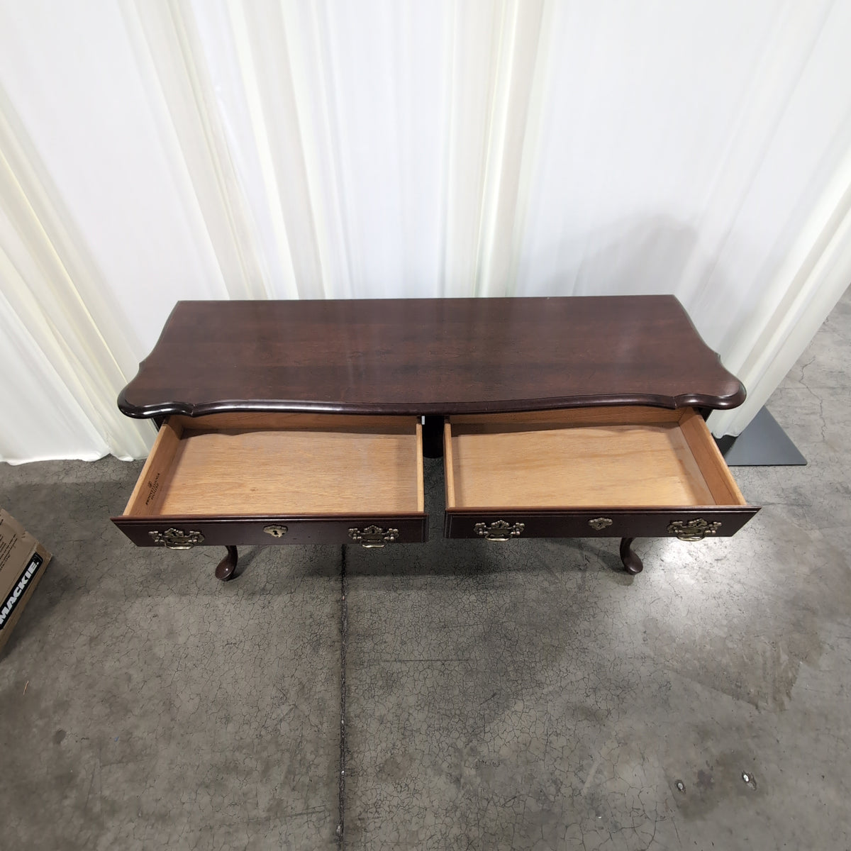 Traditional Dark Wood Console Table with Ornate Brass Hardware