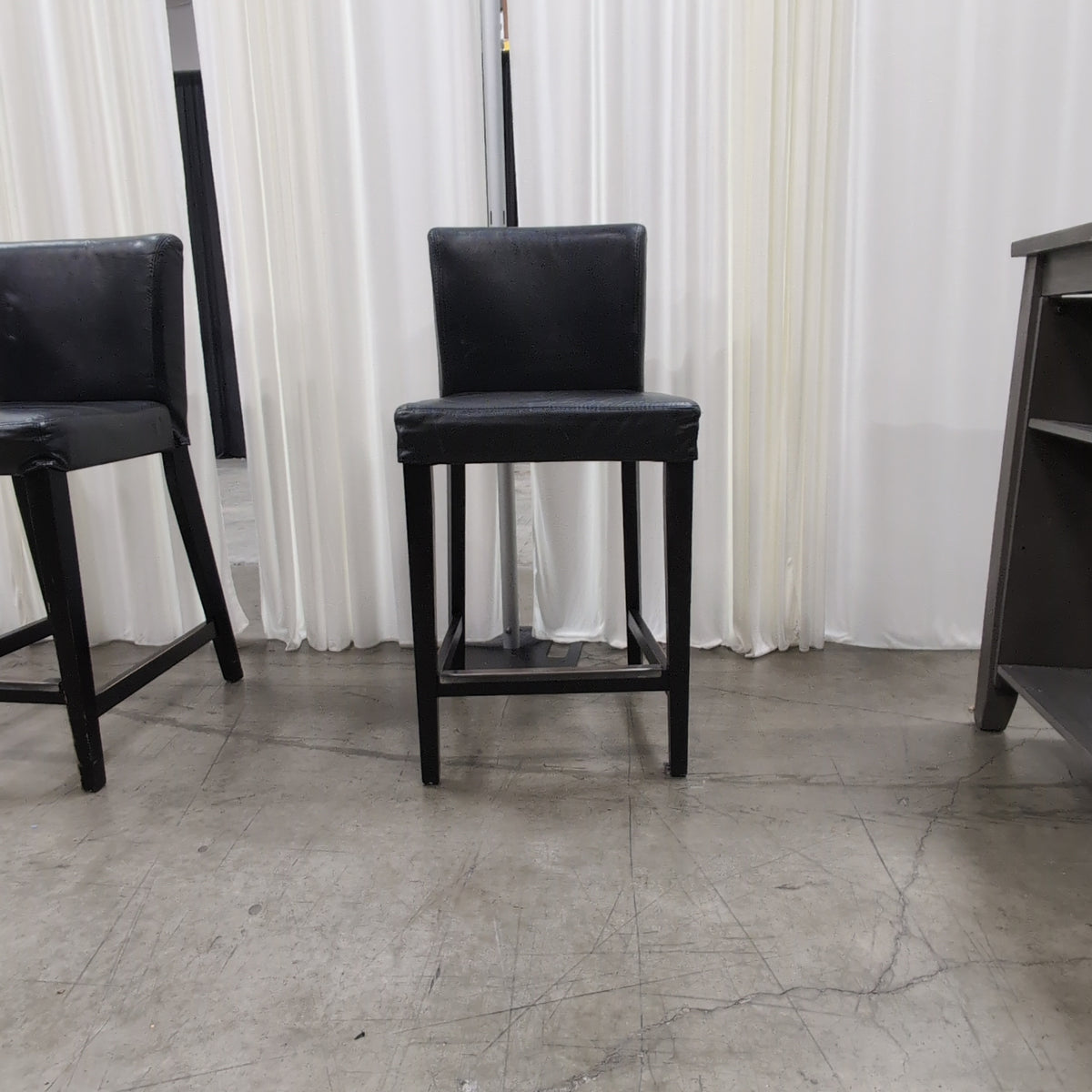 IKEA Brand Modern Black Faux Leather Bar Stool with Metal Footrest