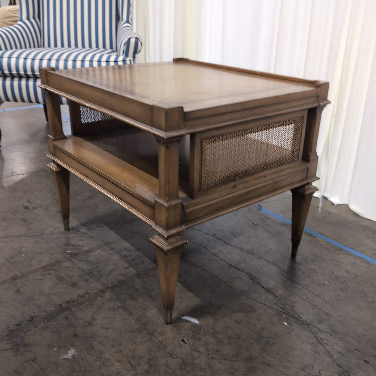 Brown Wood Two-Tier End Table with Cane Sides