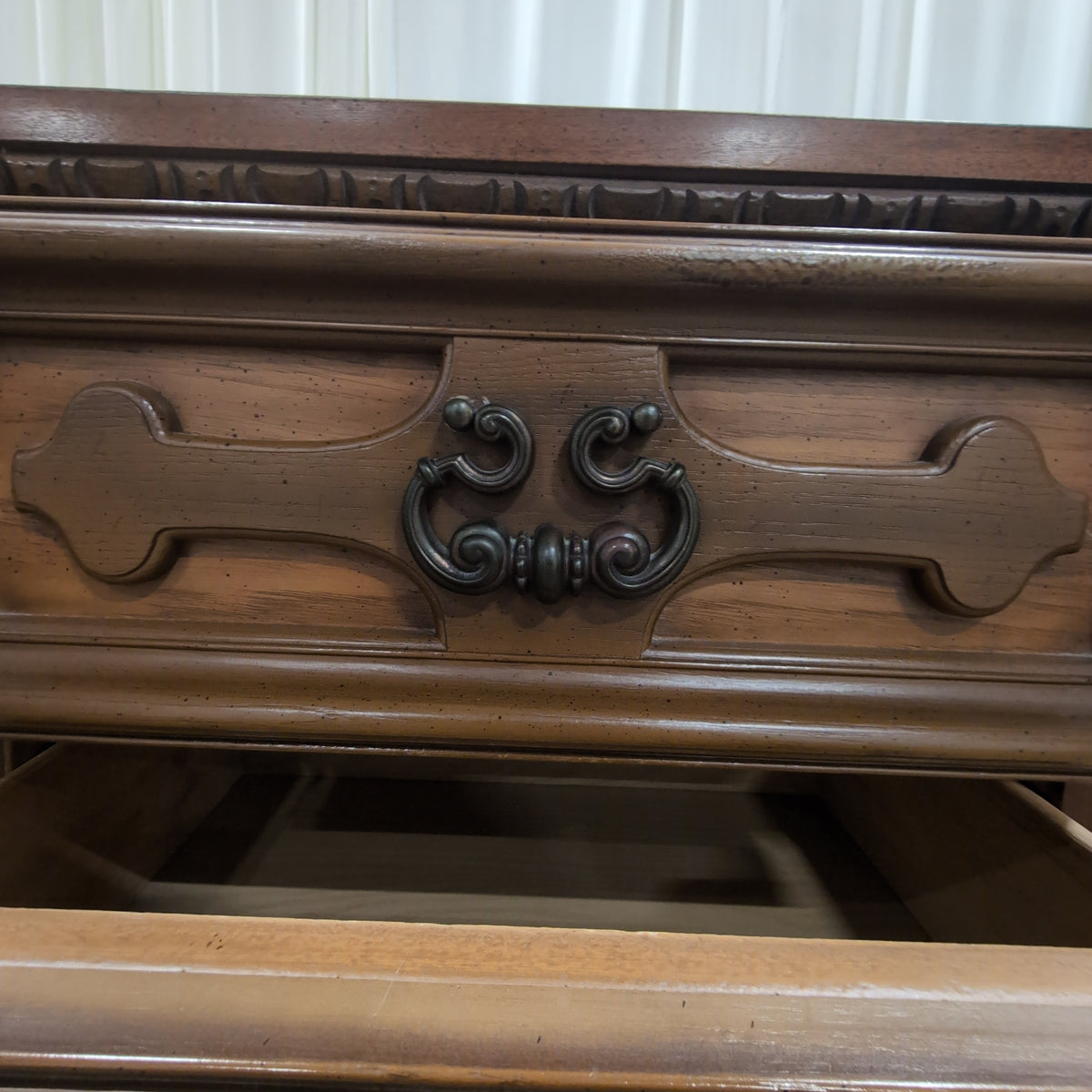 Traditional Brown Wood Dresser with Ornate Hardware