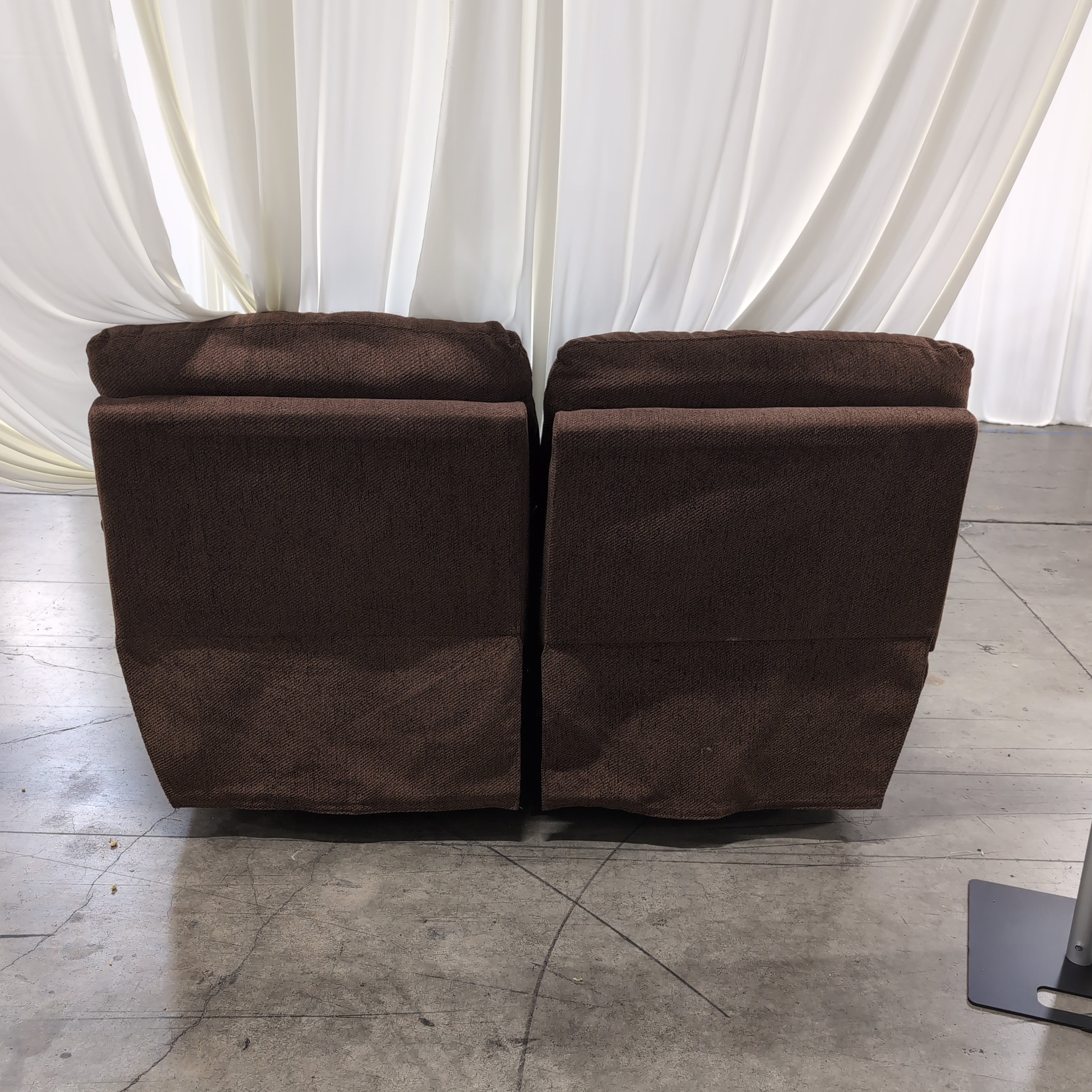 Brown Textured Fabric Reclining Loveseat with Padded Arms