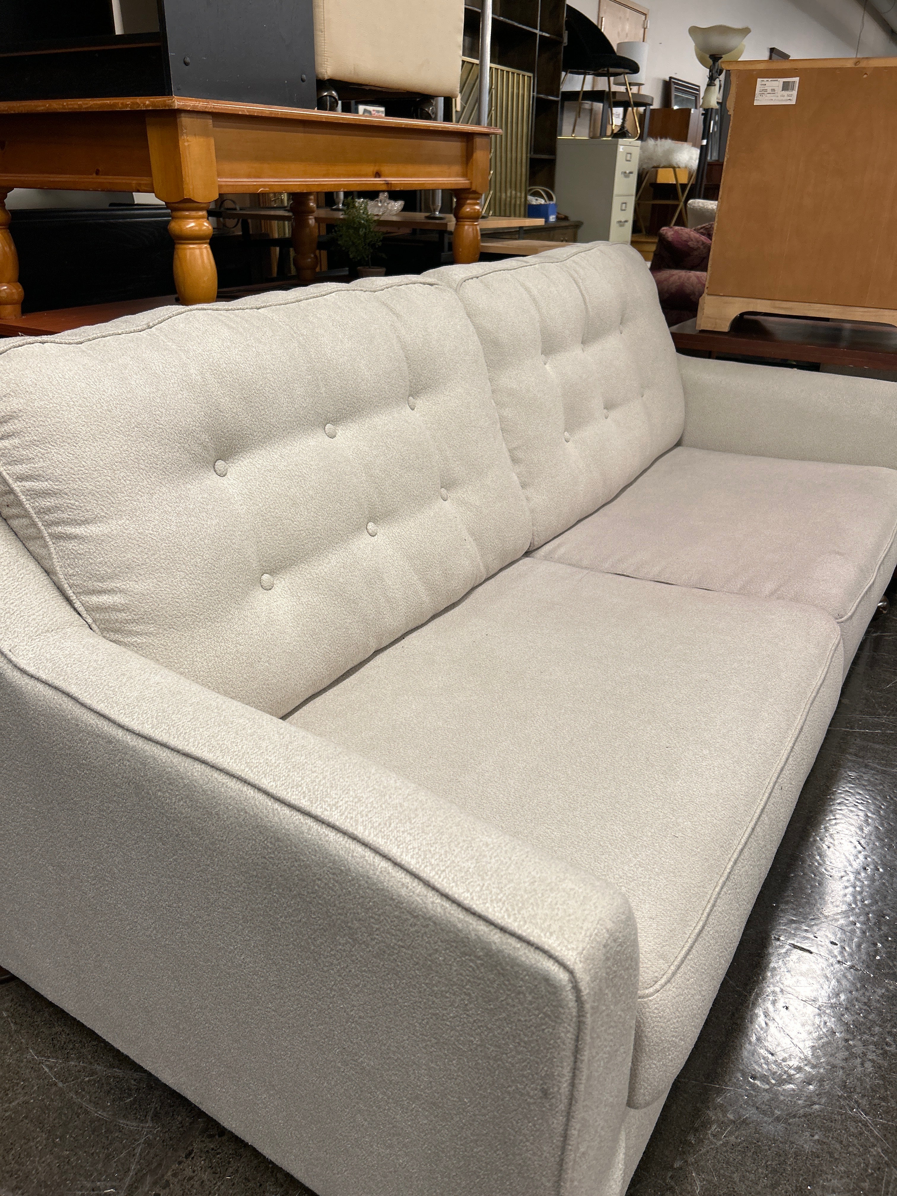 Ashley Furniture 2 Seat Cream Cloth Sofa