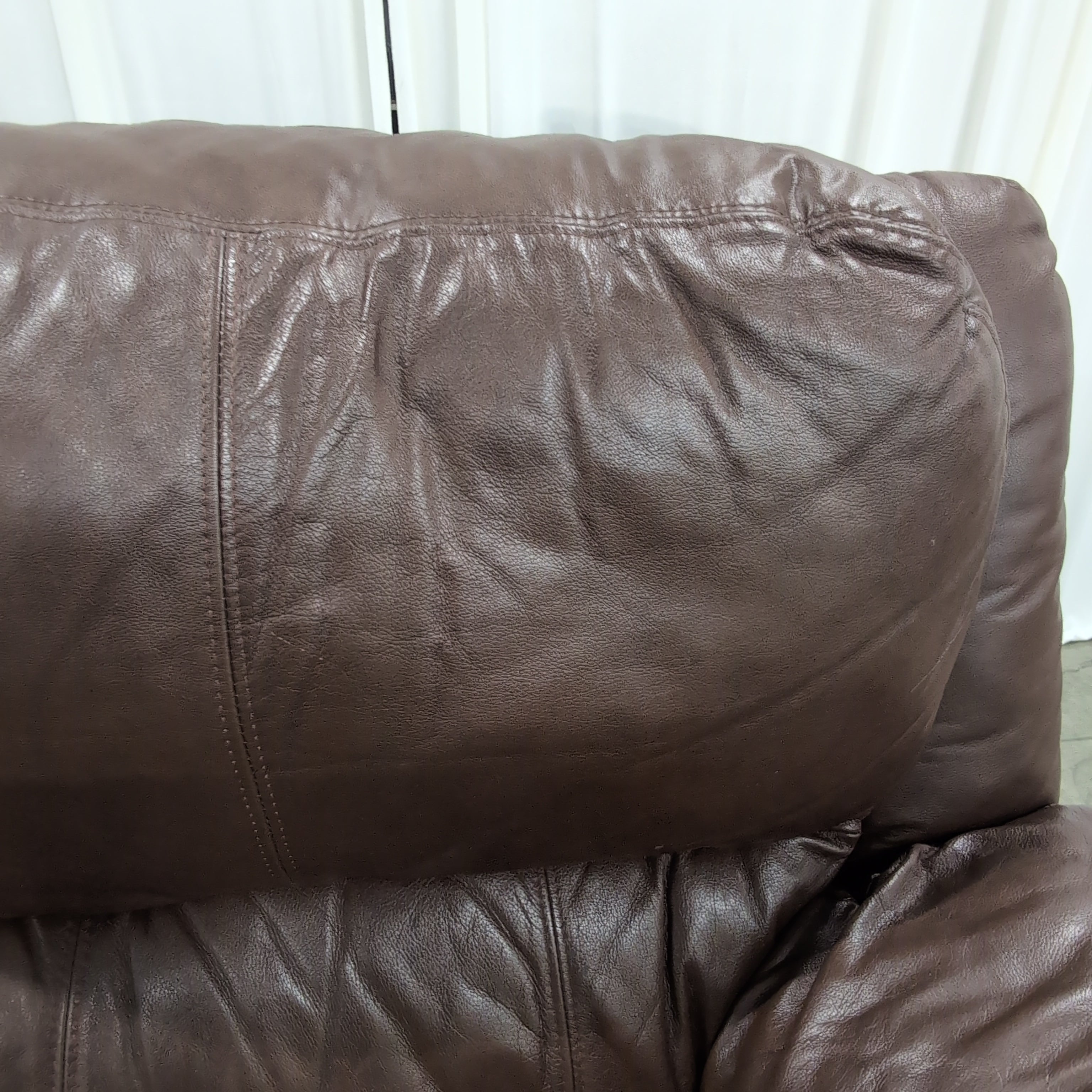 Brown Leather Three-Seat Recliner Couch