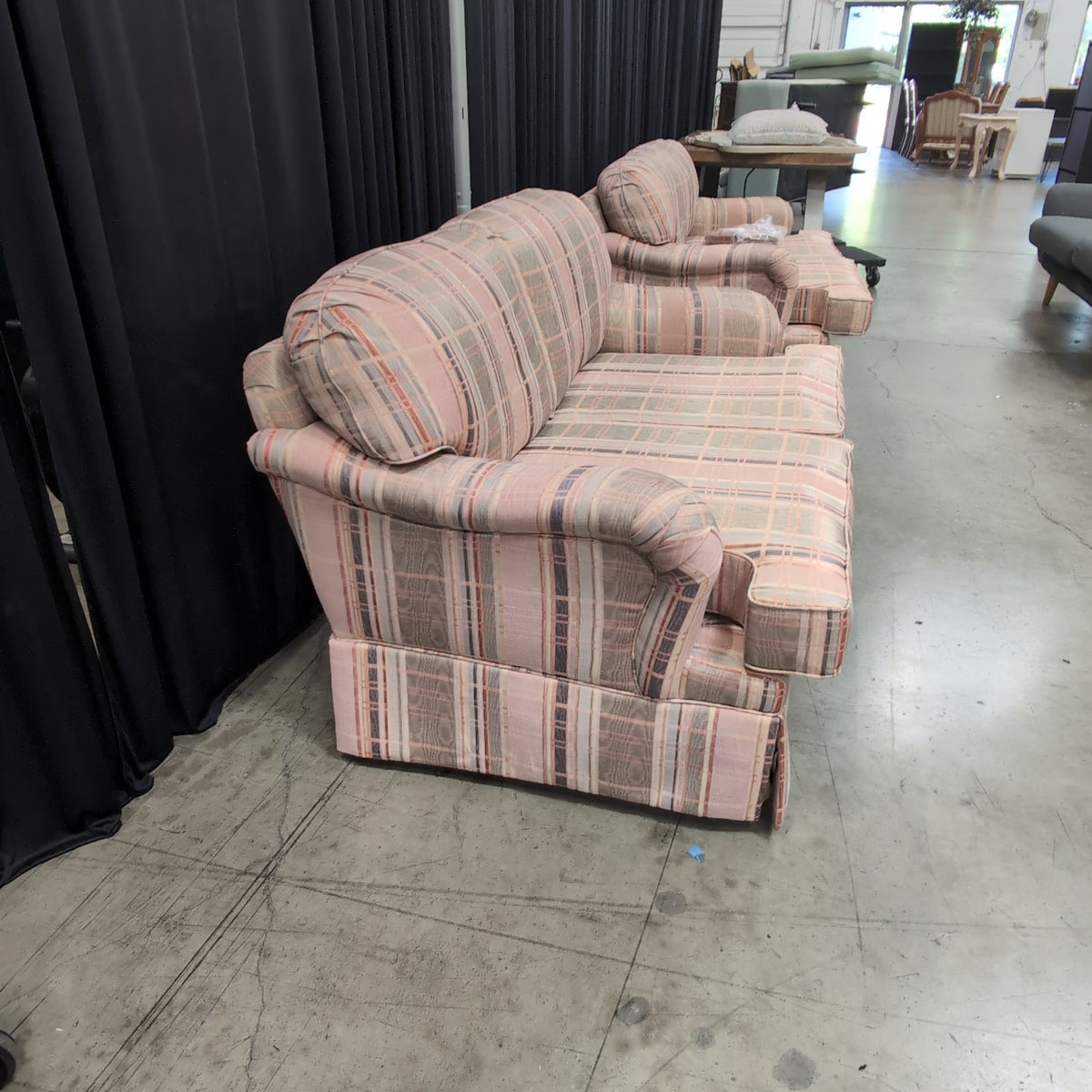 Multi-Color Plaid Rolled Arm Loveseat with Skirted Base