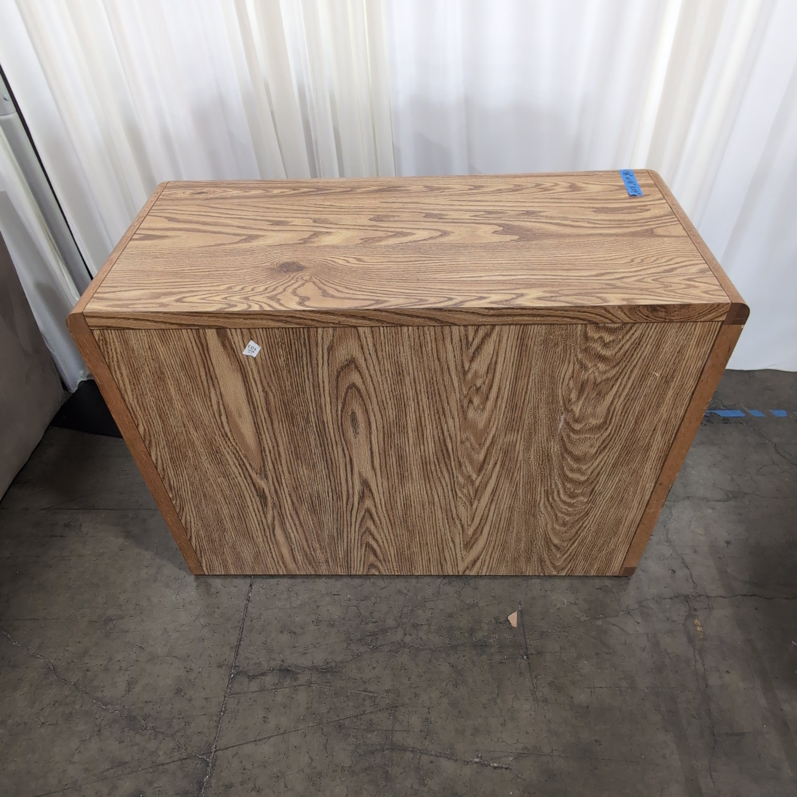 Light Oak Wood Four-Drawer Filing Cabinet