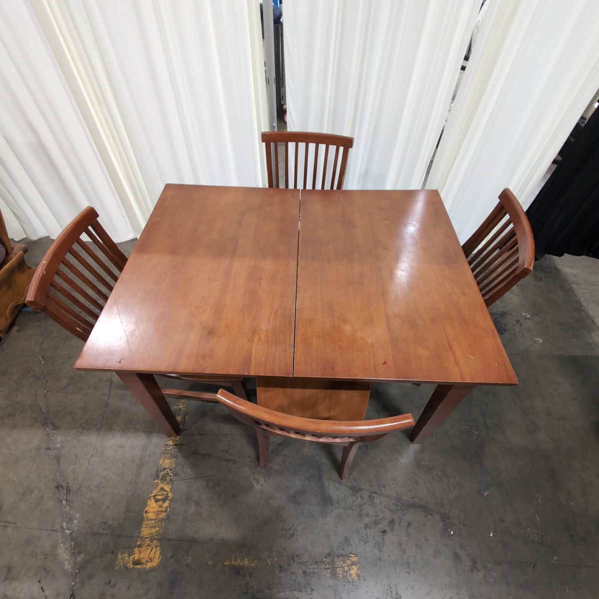 Brown Wood Dining Table and Four Chairs with Slatted Back Chairs
