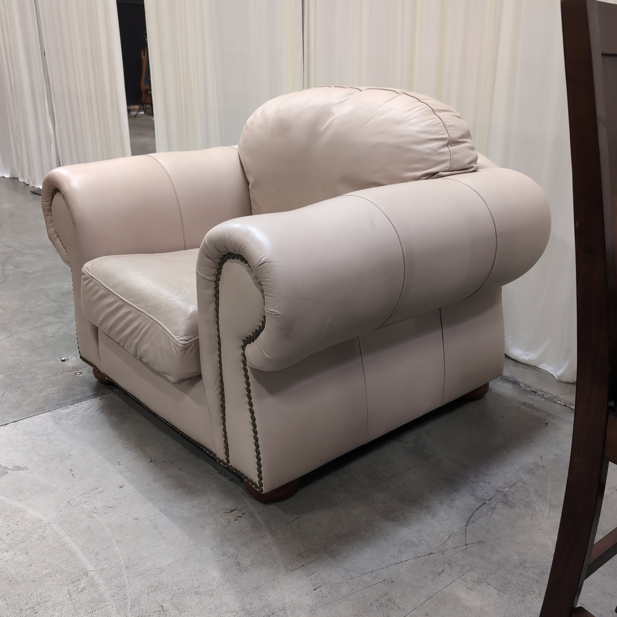 Padded Tan Armchair with Rolled Arms