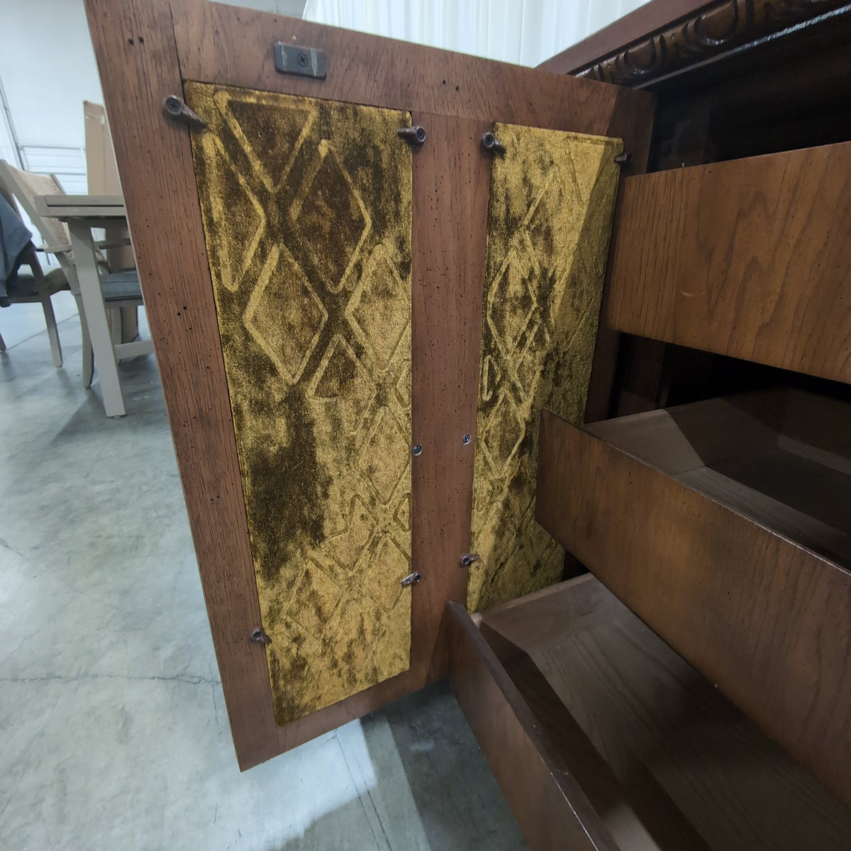 Traditional Brown Wood Dresser with Ornate Hardware