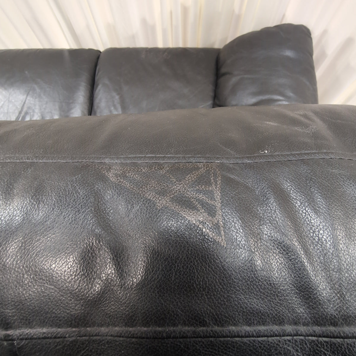 Black Leather Three-Seat Couch with Padded Arms