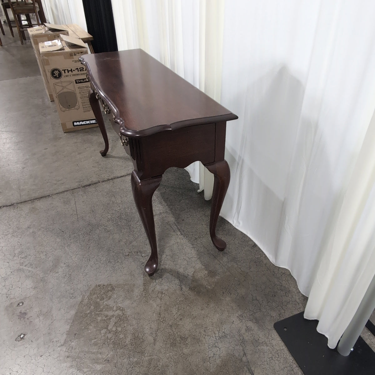 Traditional Dark Wood Console Table with Ornate Brass Hardware