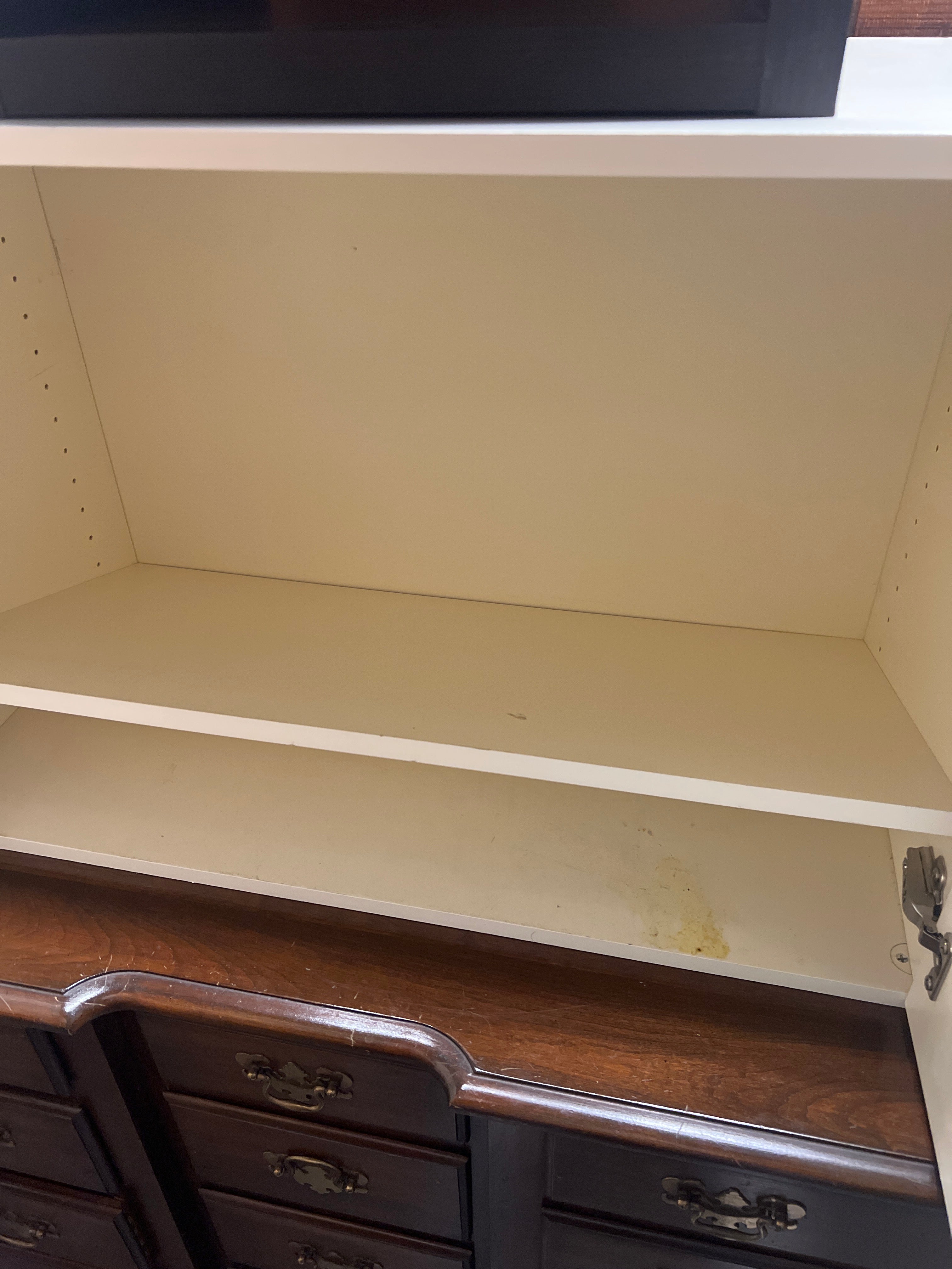 White cabinet with metal pulls