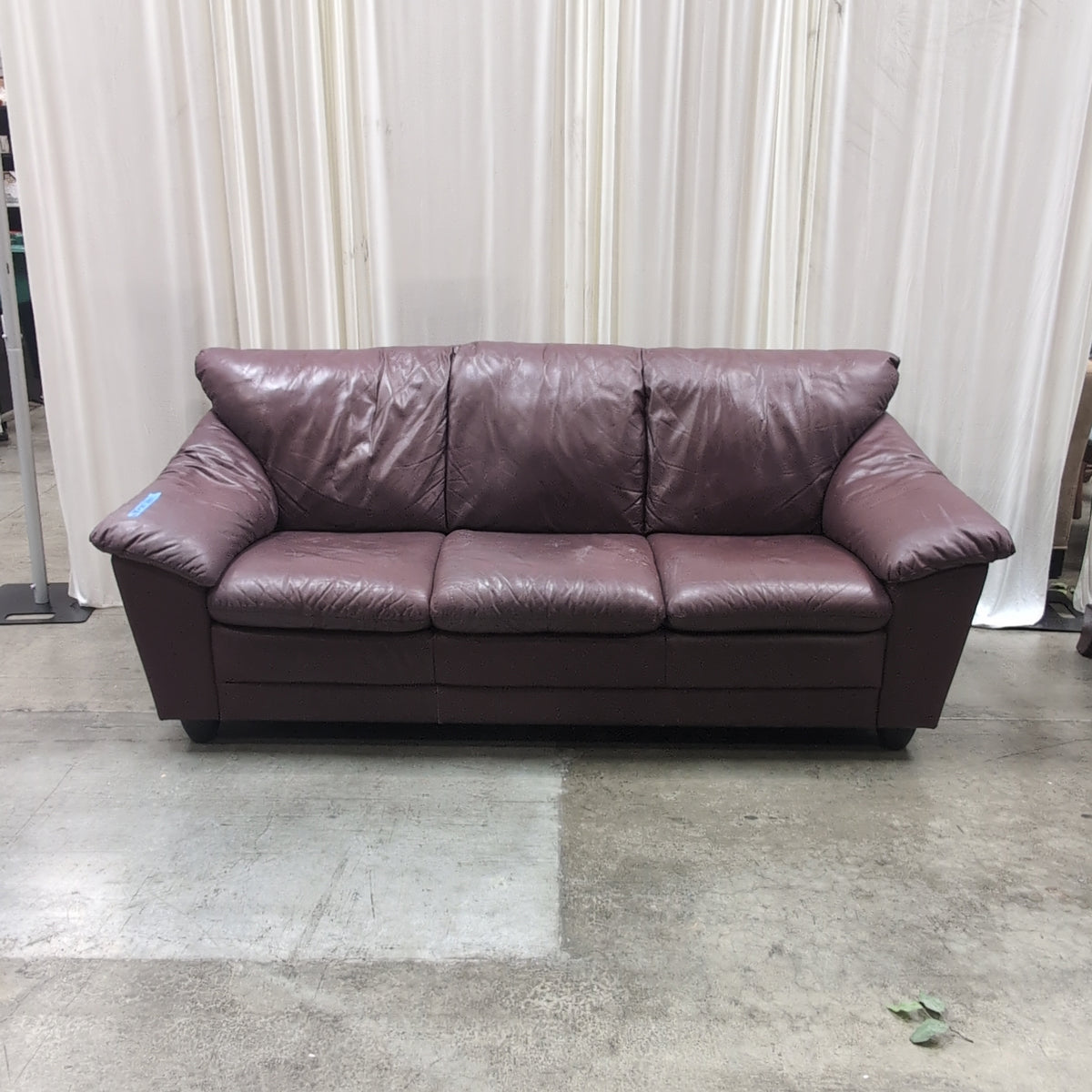 Burgundy Padded Leather Couch