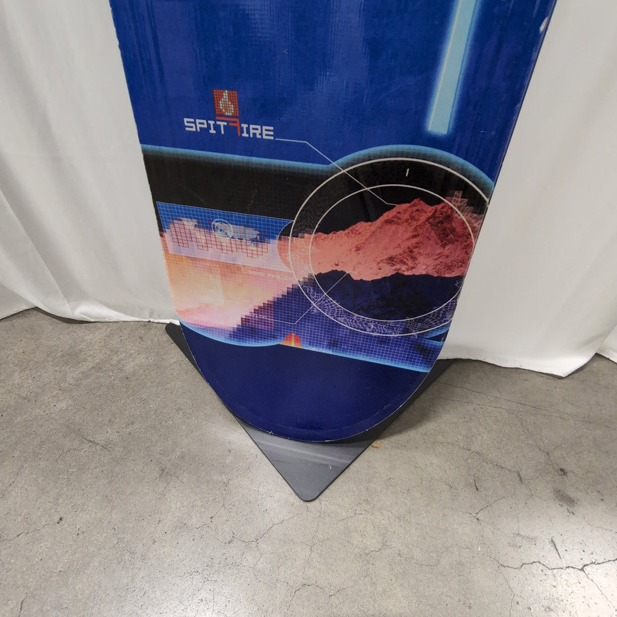 K2 Blue Snowboard with SPITFIRE Graphic