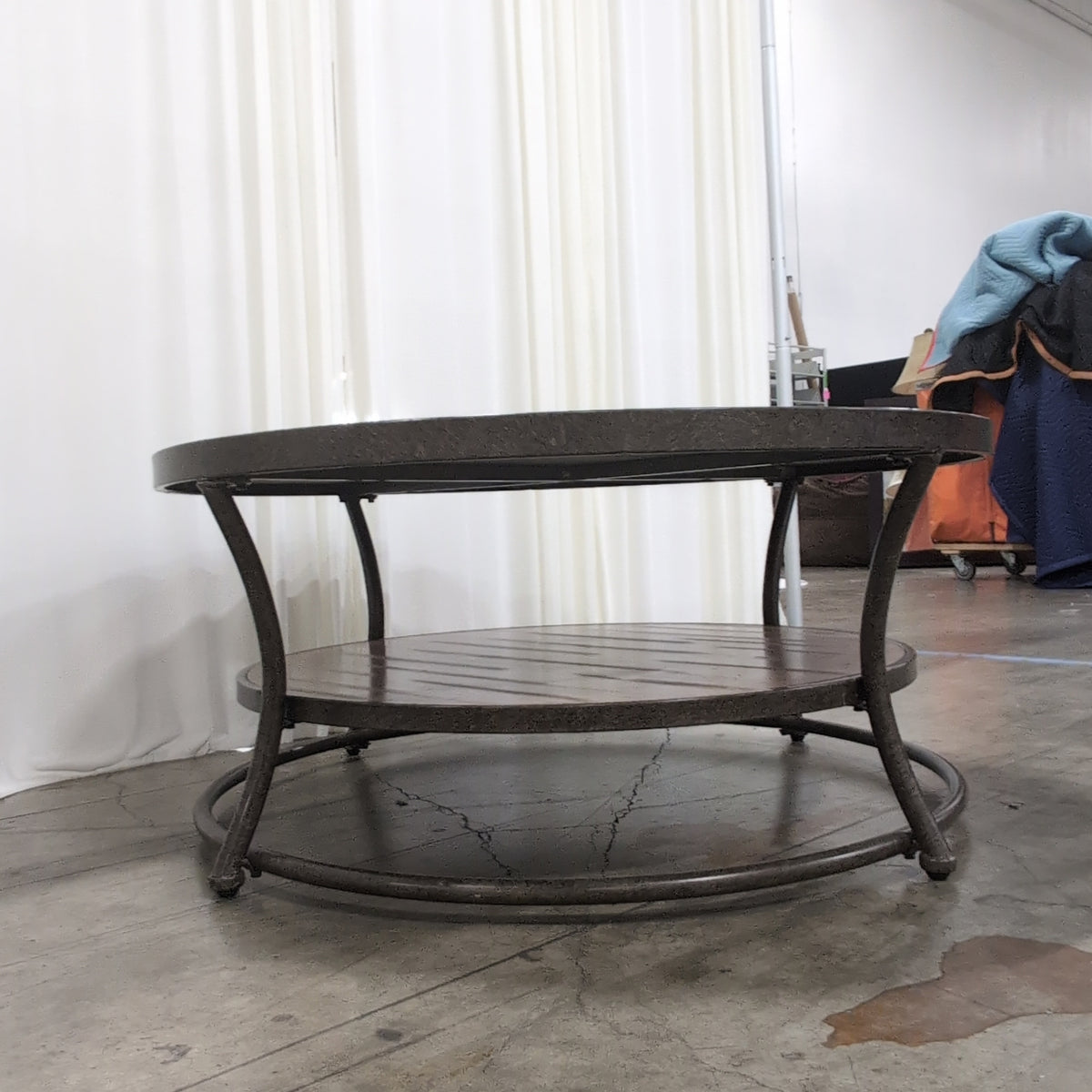 Ashley Furniture Two-Tier Round Wood Coffee Table with Metal Frame