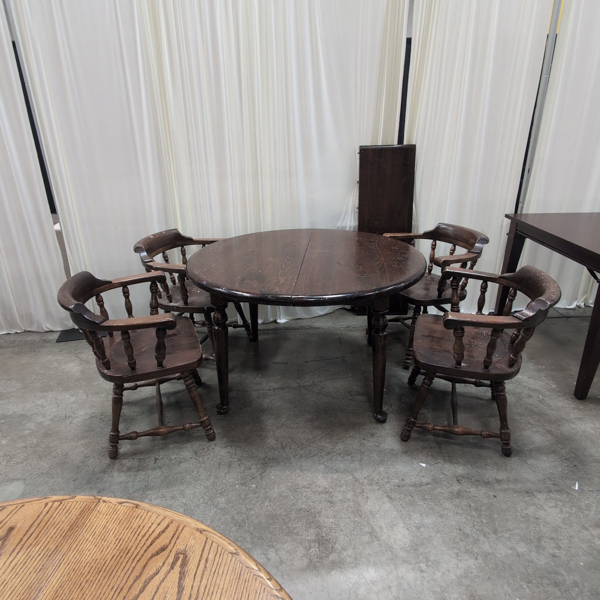 Dark Wood Round Dining Table with Spindle Chairs